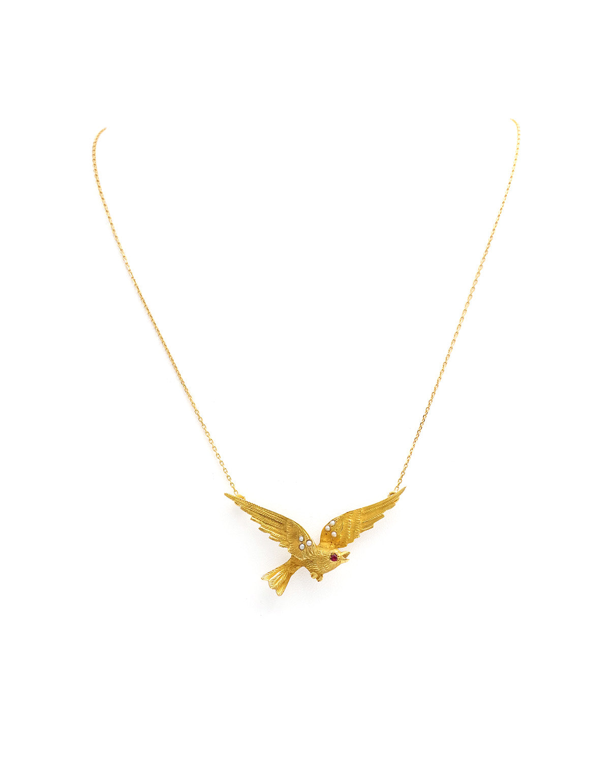 Bird ruby necklace in gold