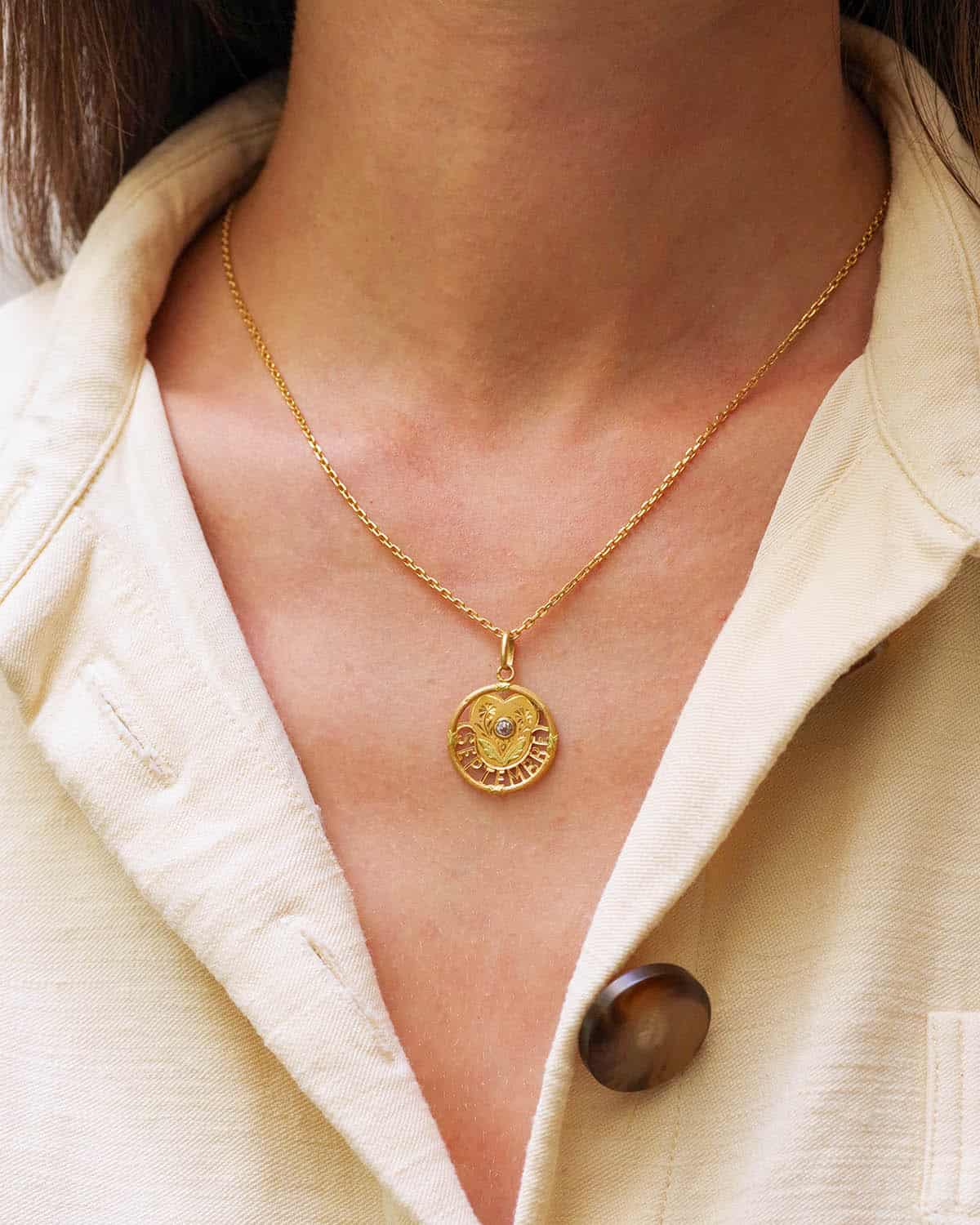 september birthday medal pendant
