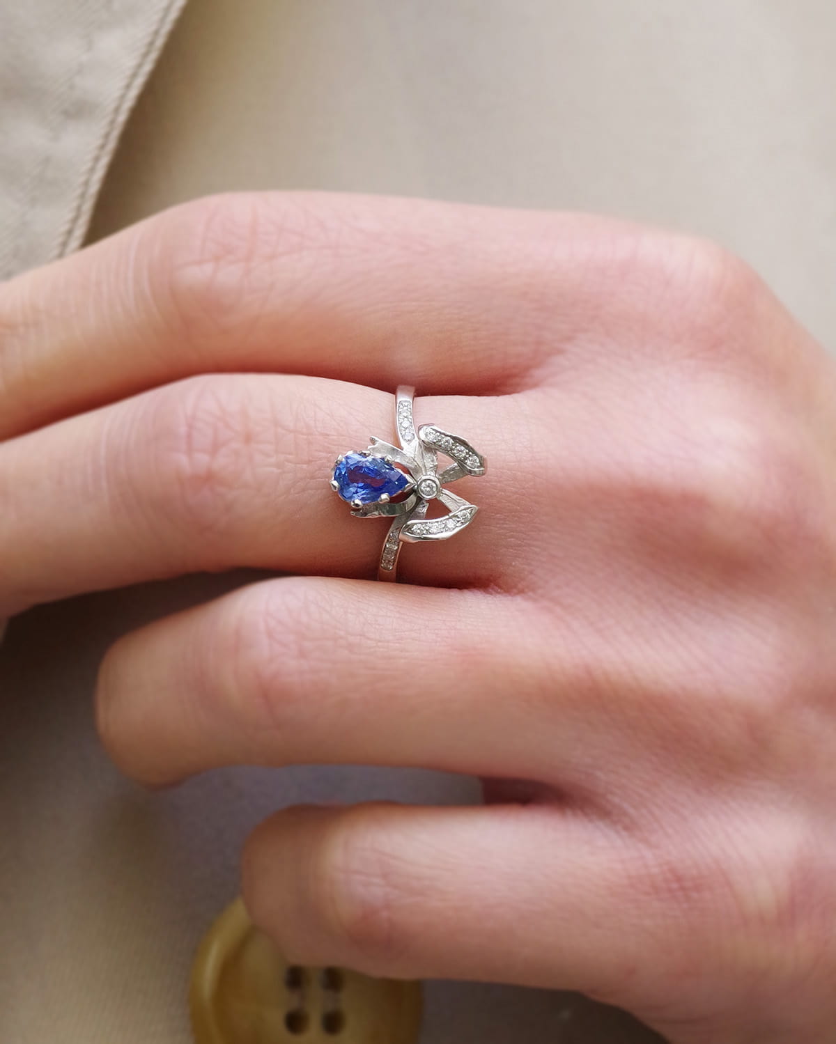 Pear-cut sapphire bow ring