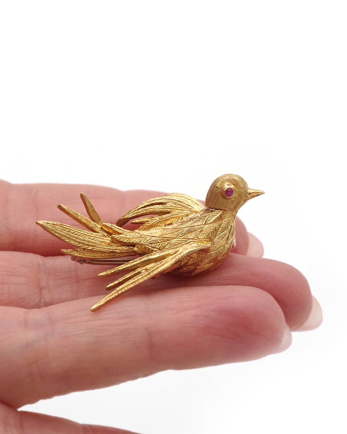 Bird gold brooch