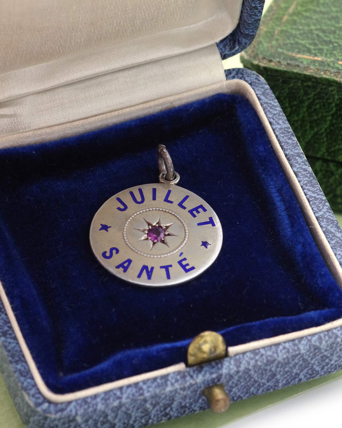 Antique july medal pendant