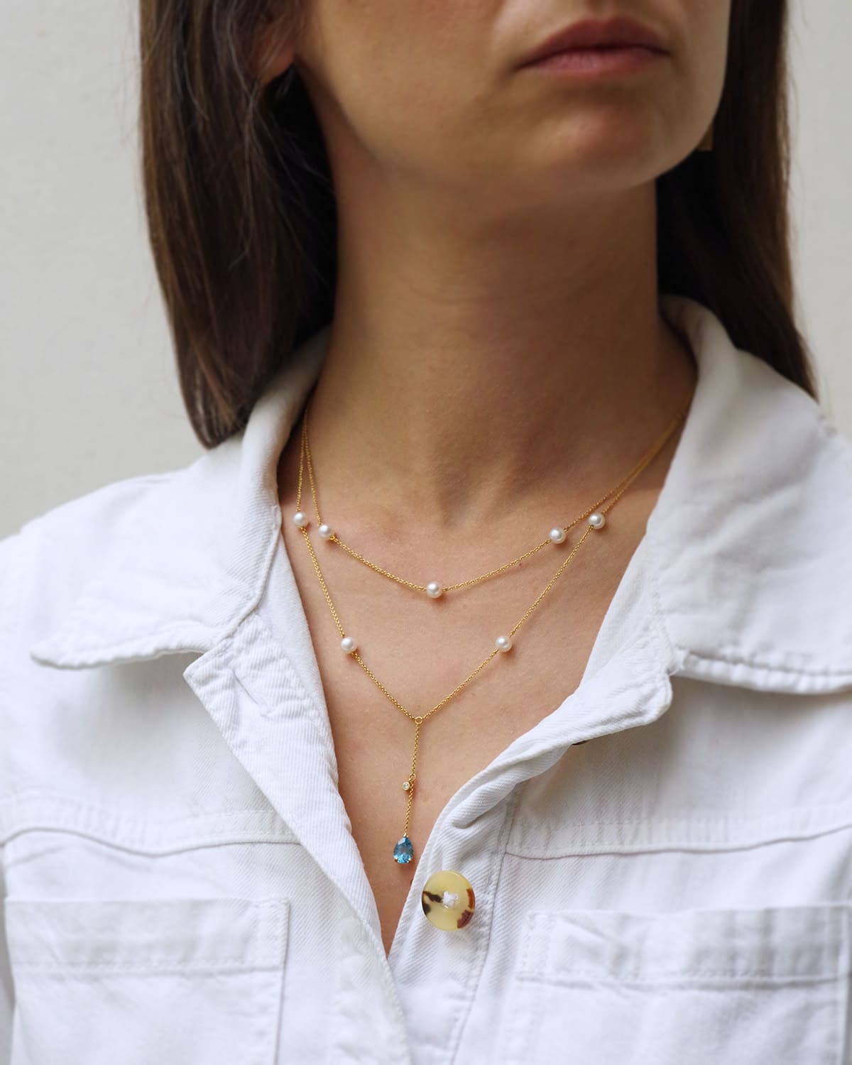 Cultured pearl blue topaze necklace in gold