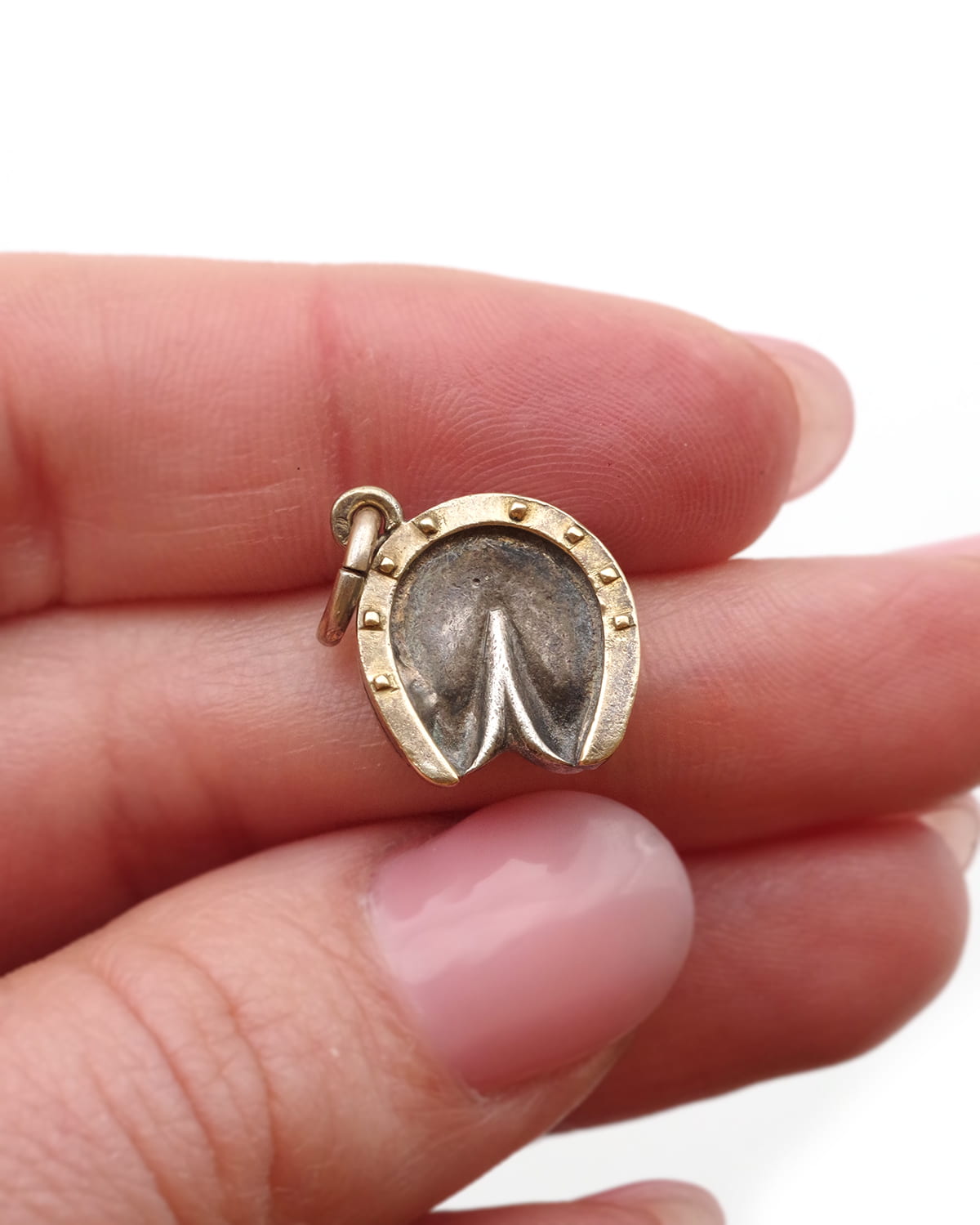 Antique silver horse shoe pendant