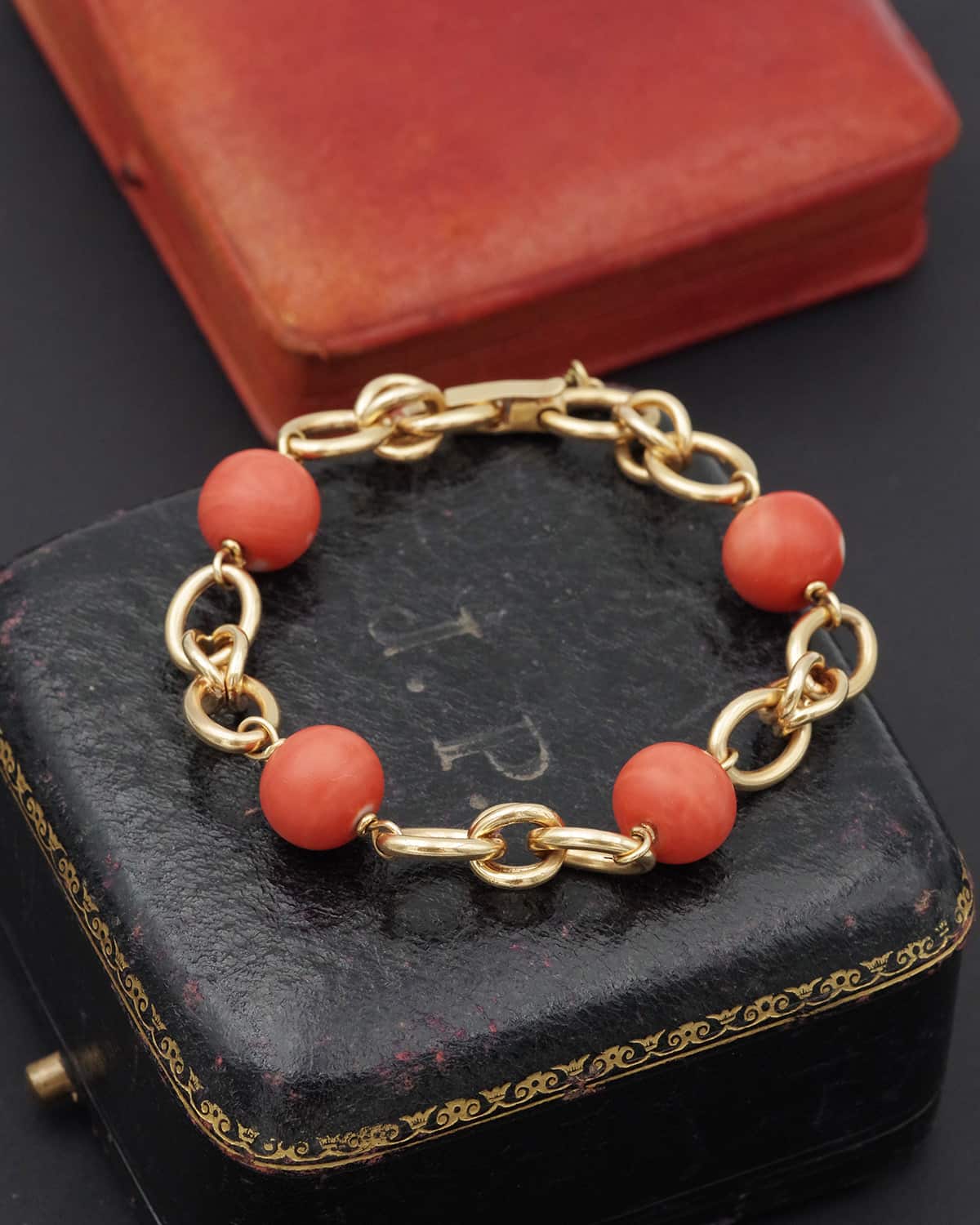 coral bead bracelet in gold