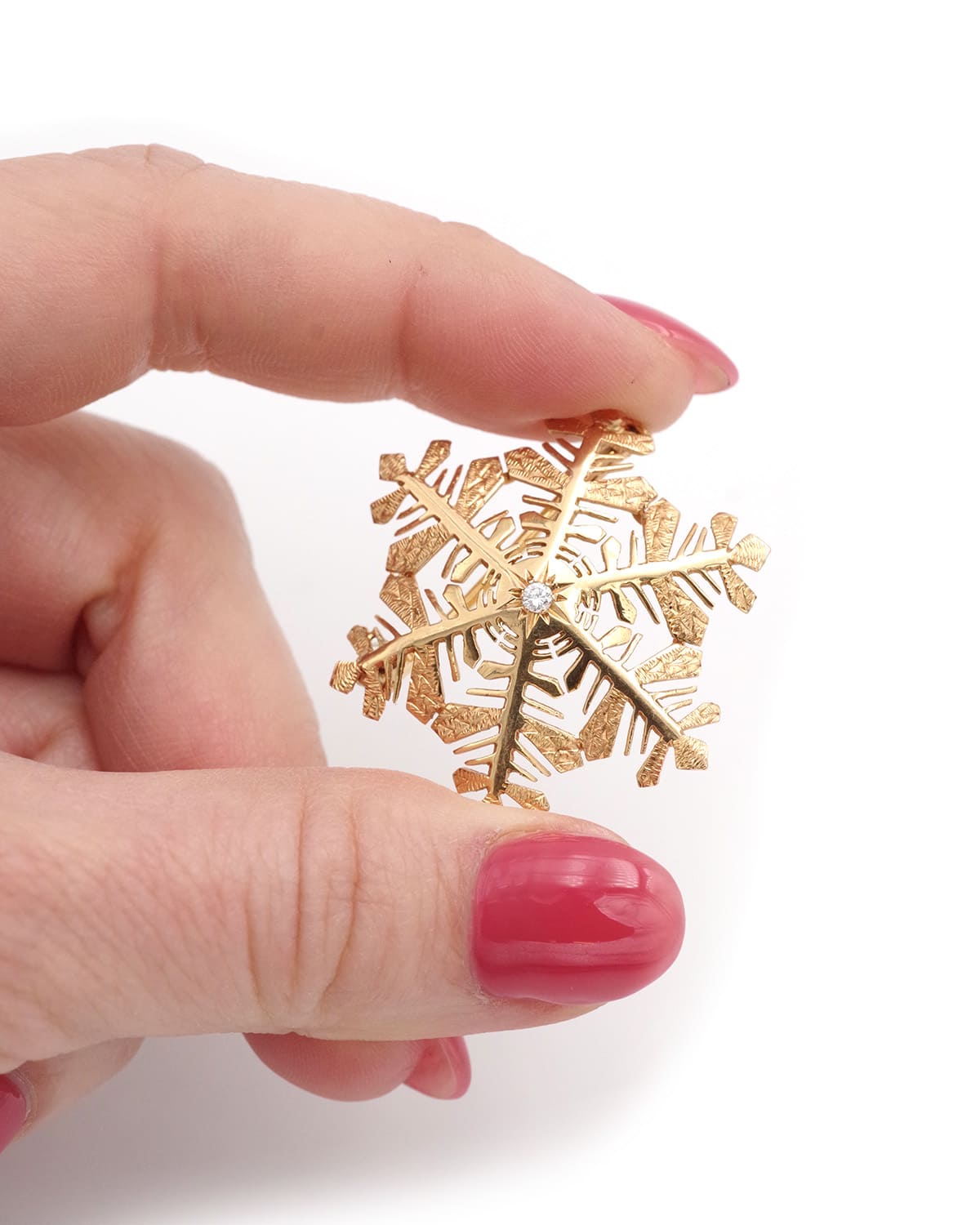 Retro snowflake brooch in gold