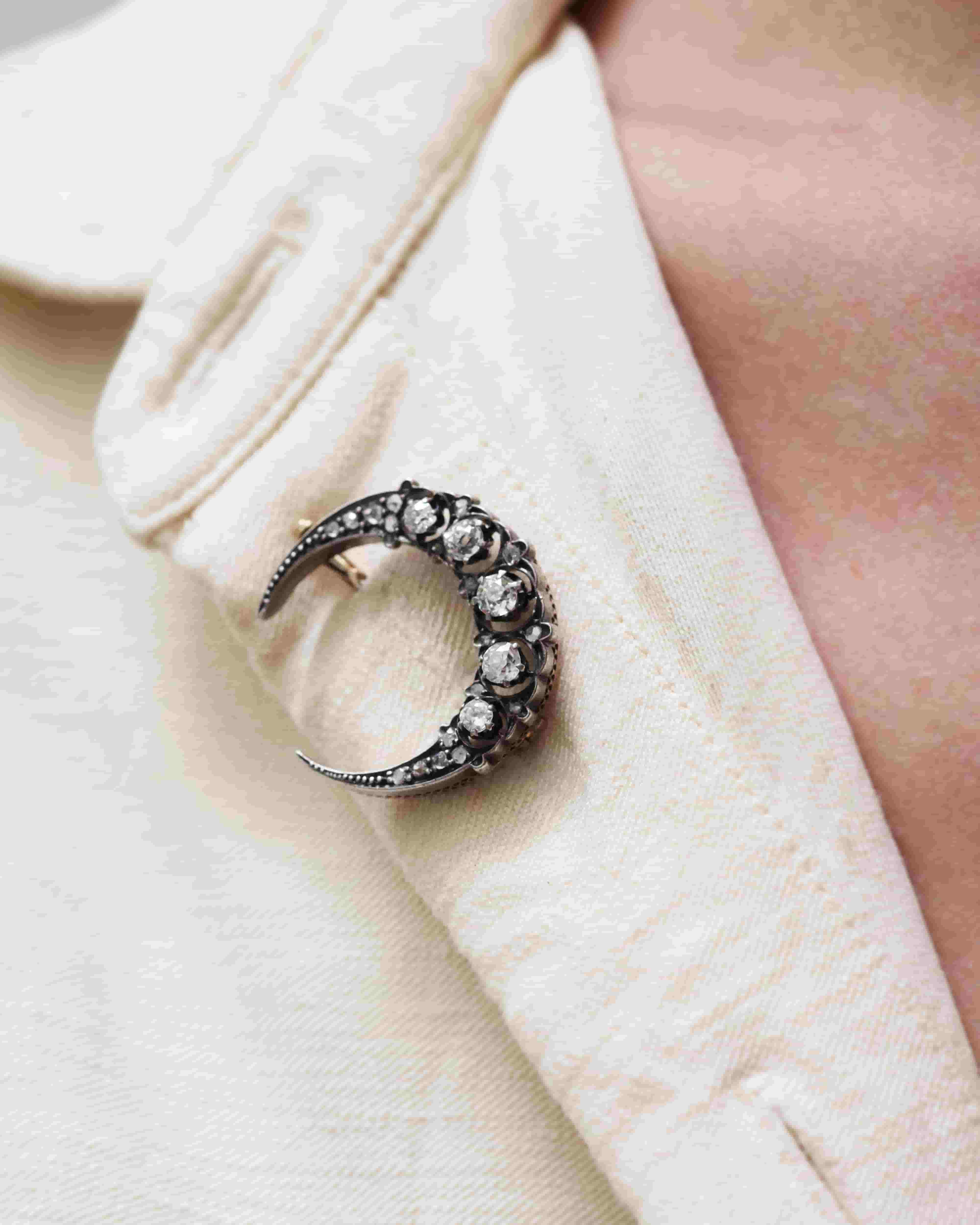 Antique diamond moon brooch