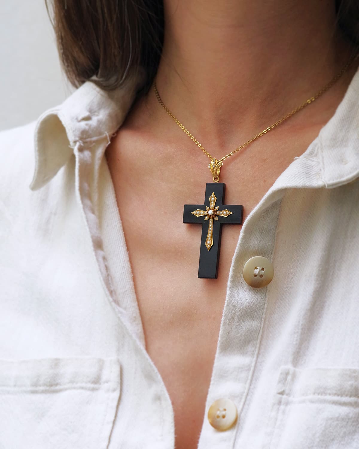 Pearl onyx cross pendant