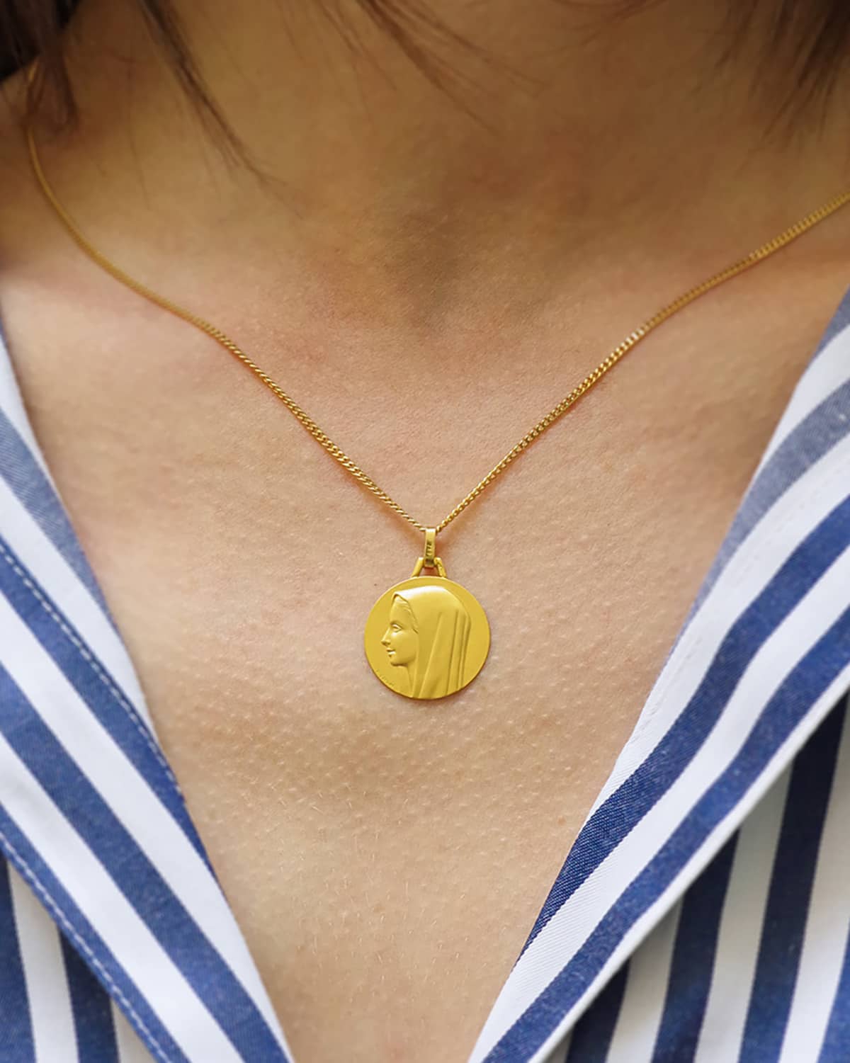 Mary Virgin gold medal