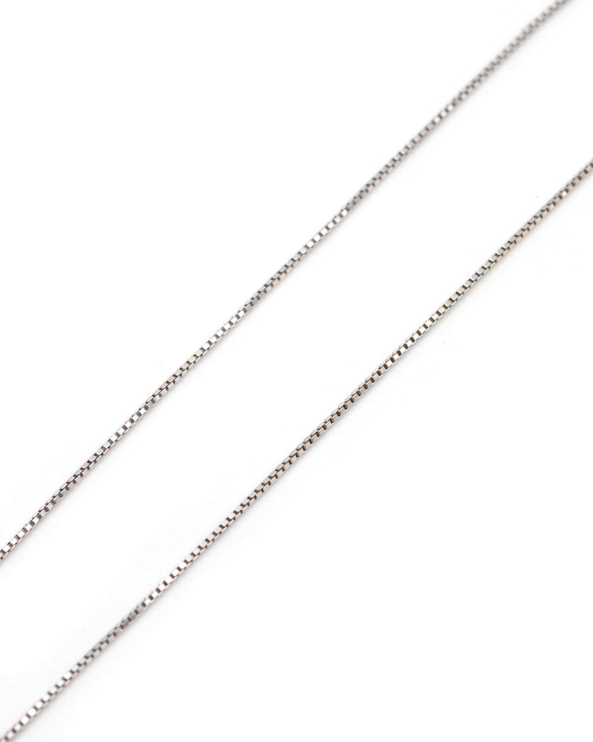 Chaine vintage en or blanc