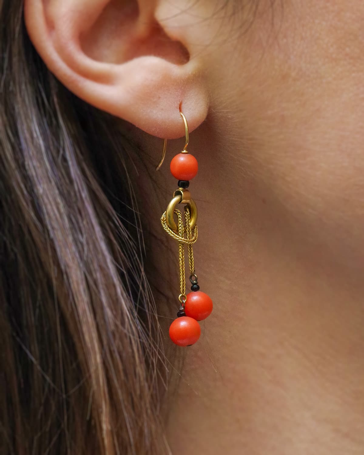 Antique coral bead in gold