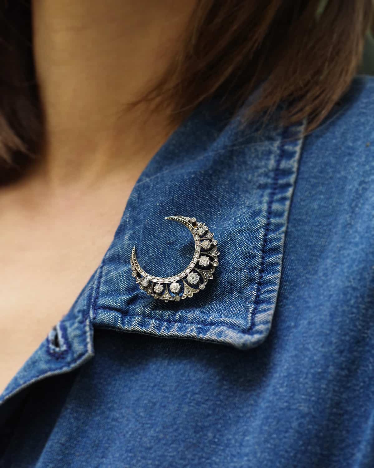 Diamond moon brooch in gold and silver