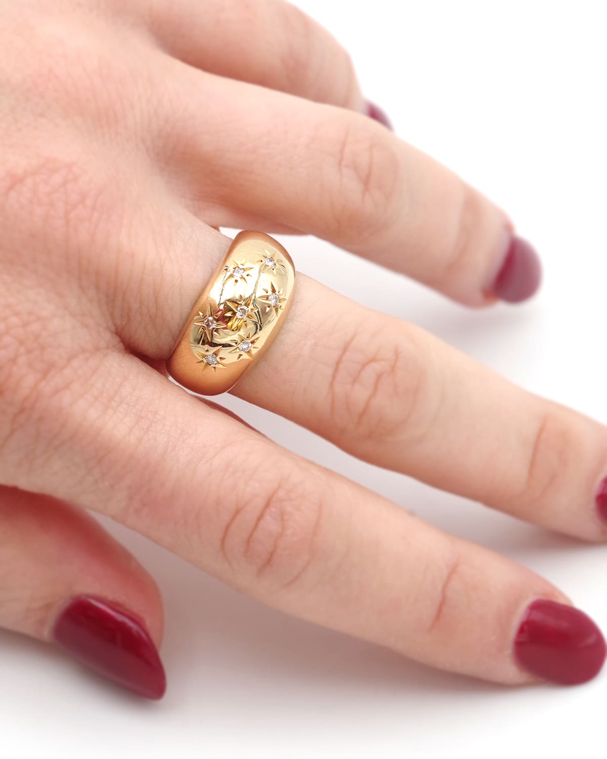 Gypsy diamond ring in gold