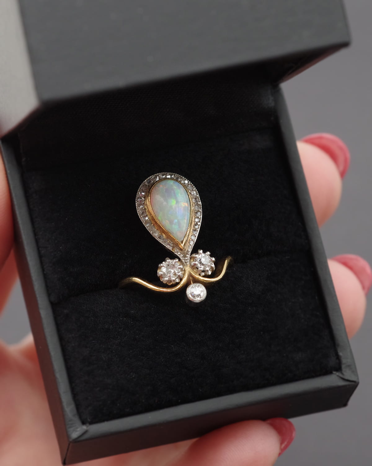 Opal diamond ring in gold
