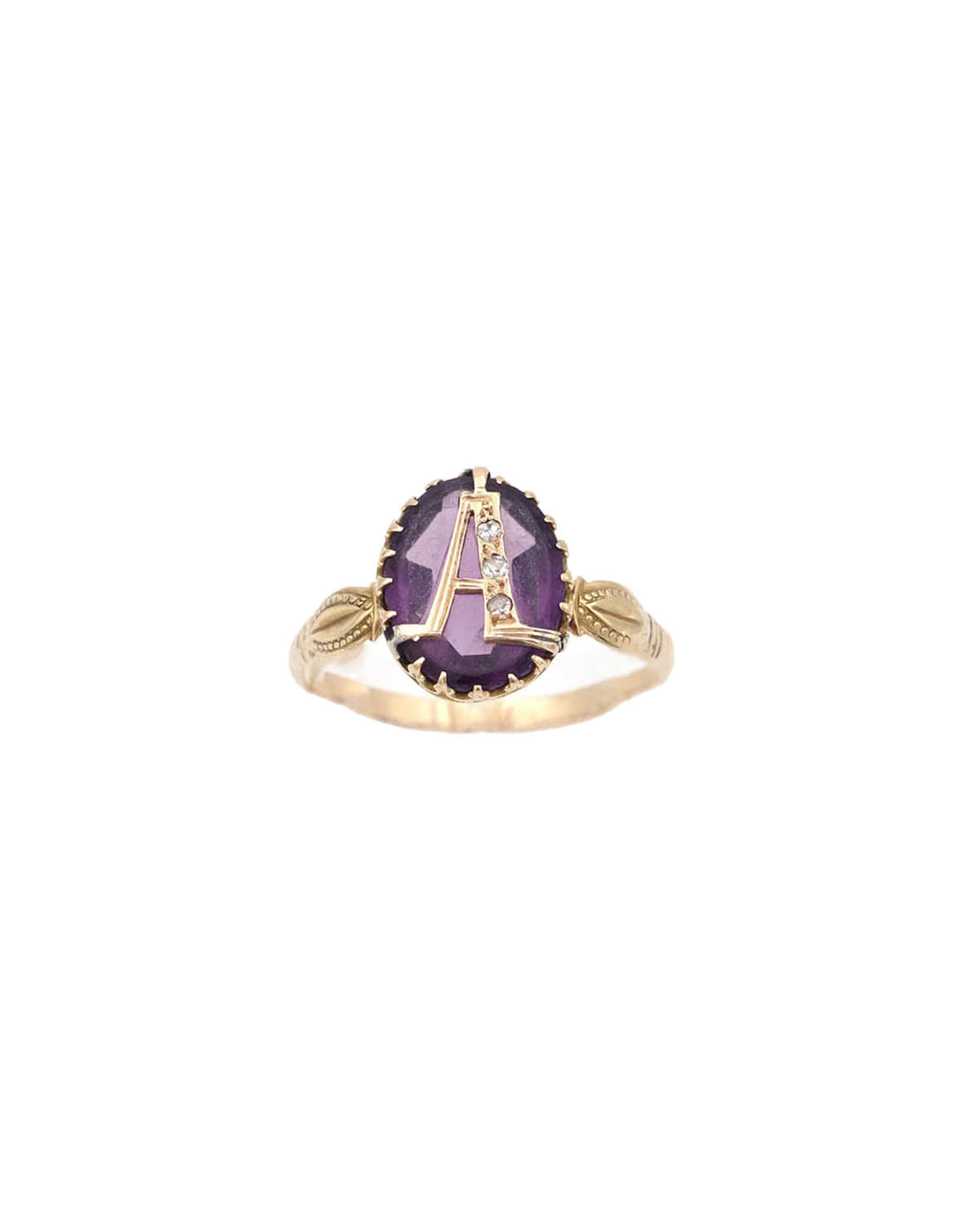 A diamond letter amethyst ring in gold