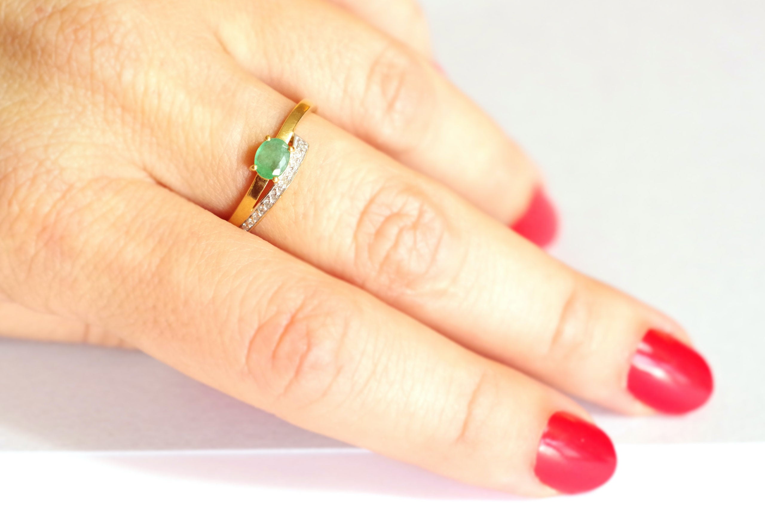 bague occasion émeraude diamants en or 18k