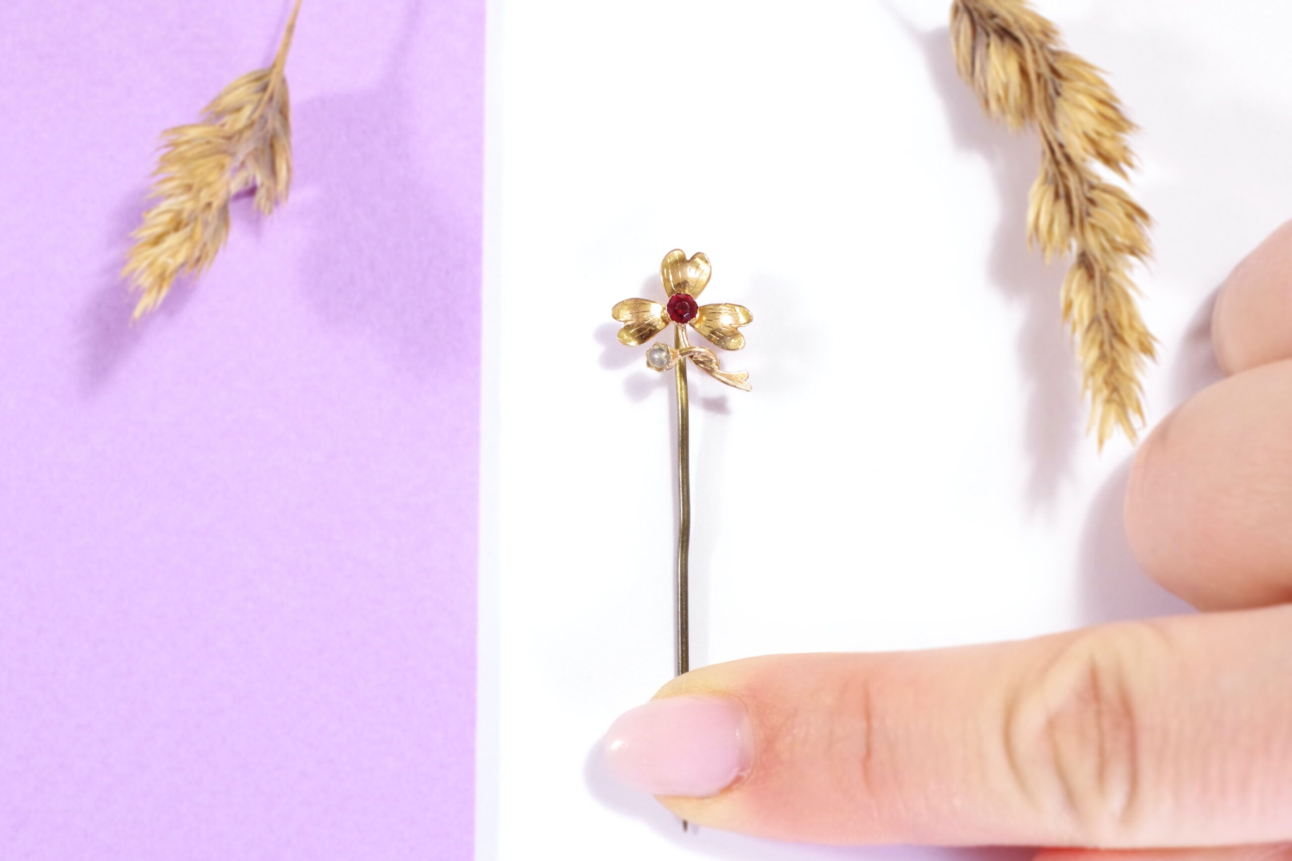 Gold clover tie pin