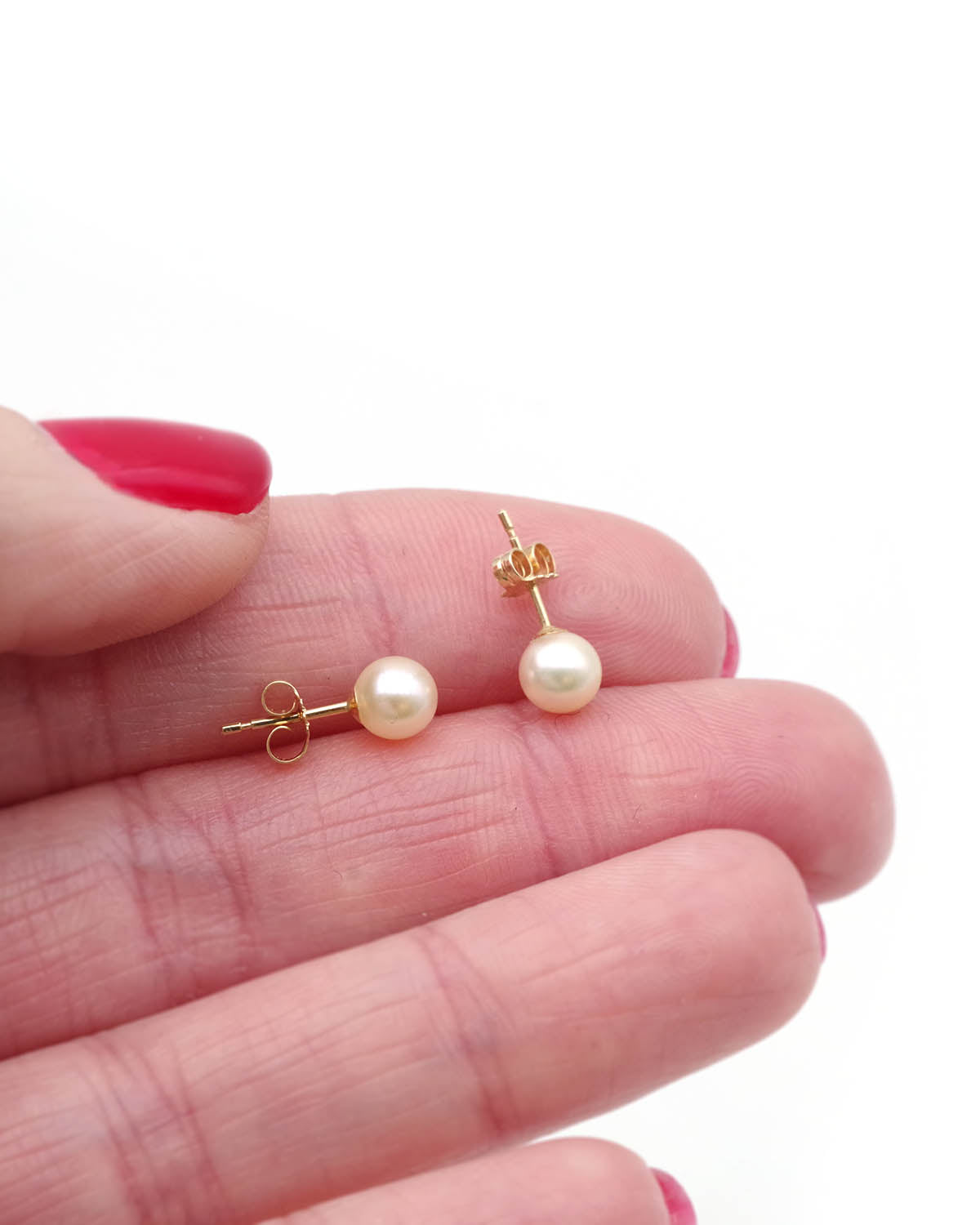 Vintage cultured pearl earrings in gold