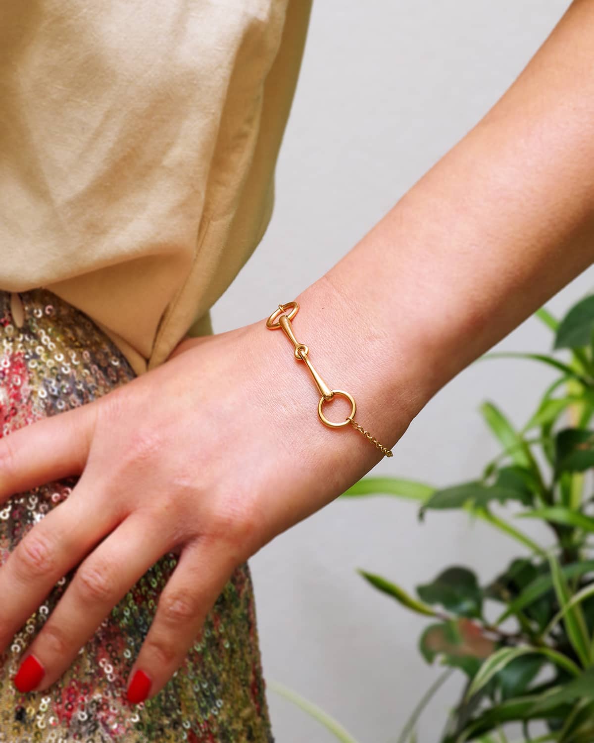 Hermes gold bracelet with a diamond