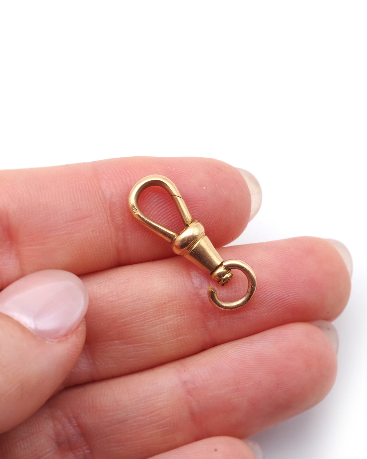 Antique gold dog clasp
