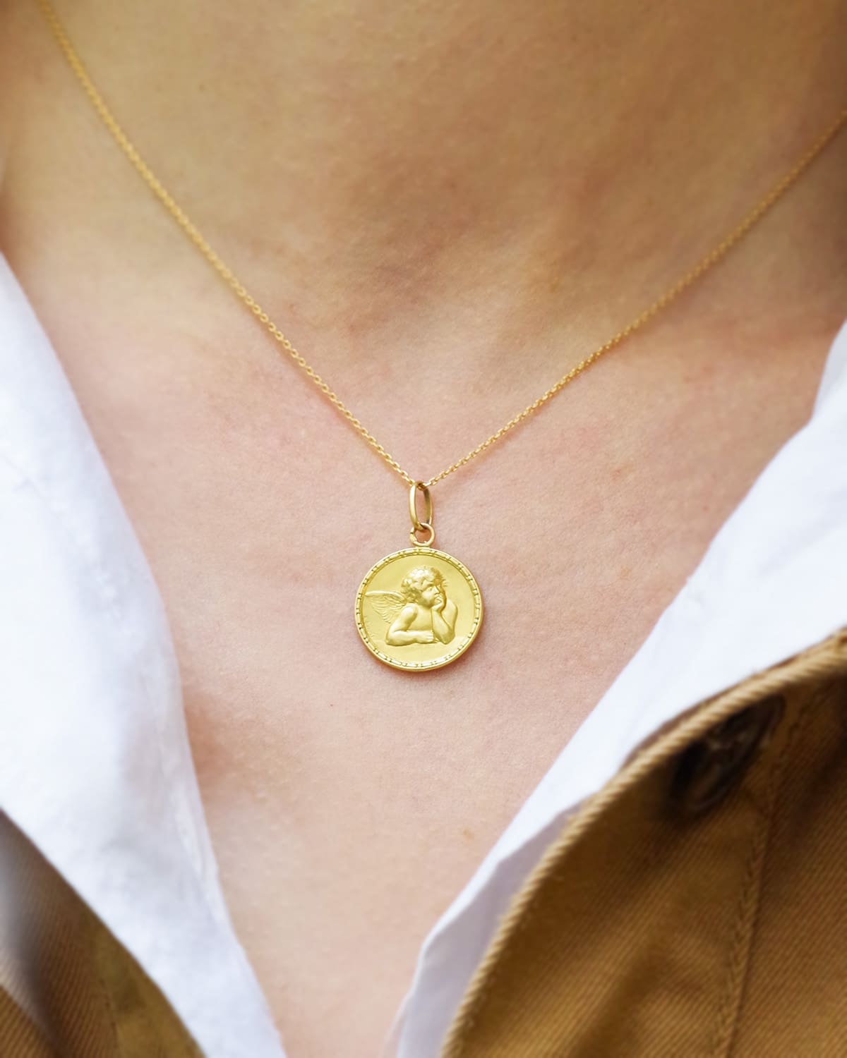 Antique angel dropsy medal