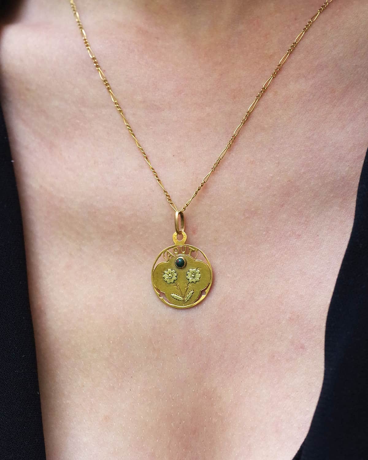 August birth pendant in gold
