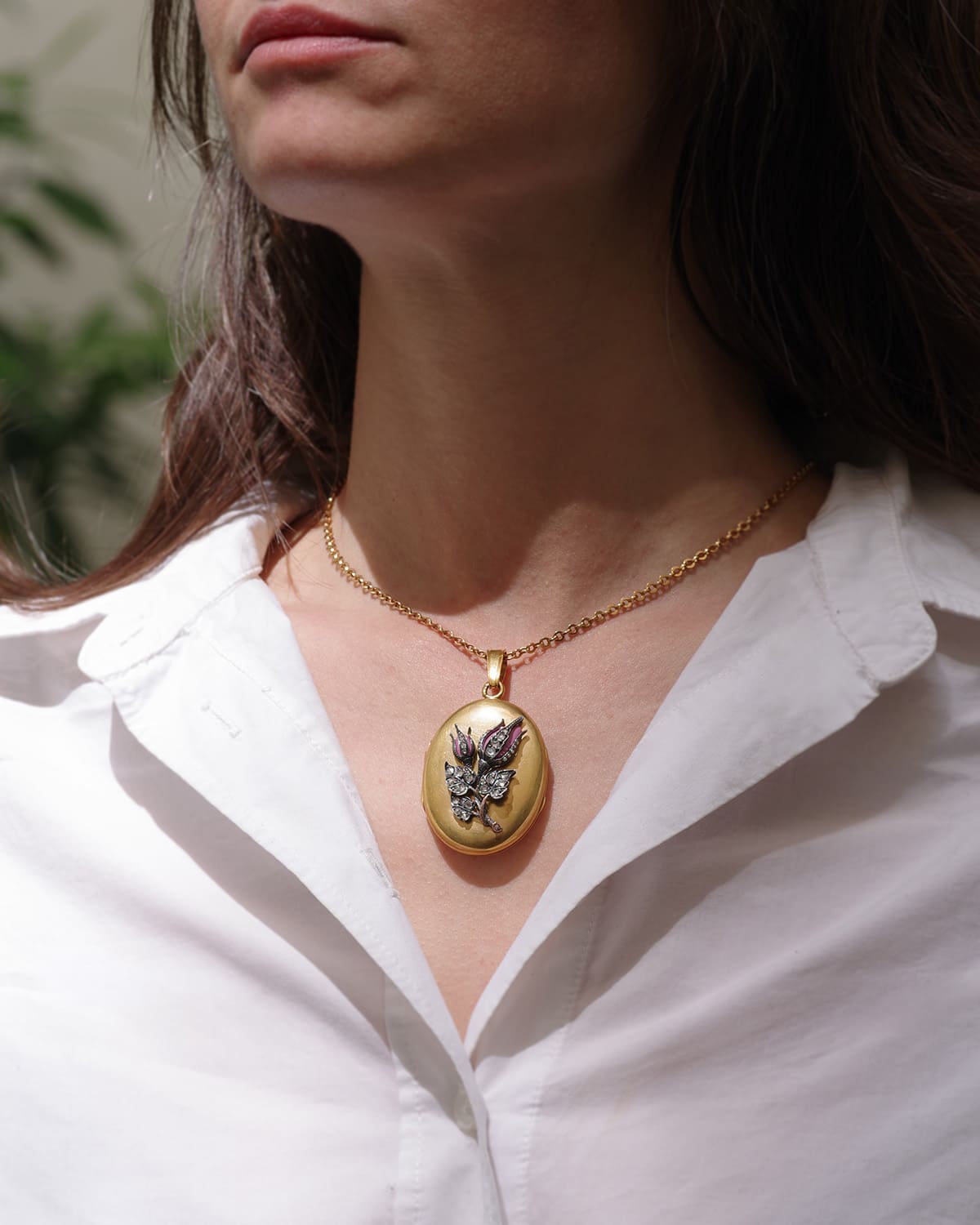 Gold and diamond rosebud locket pendant