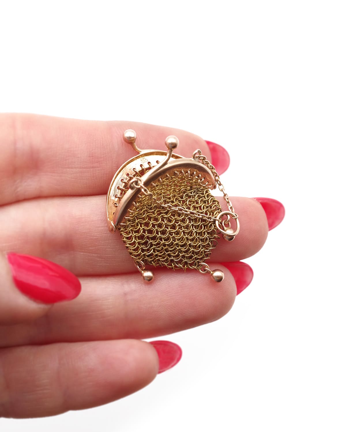 Antique purse pendant in gold