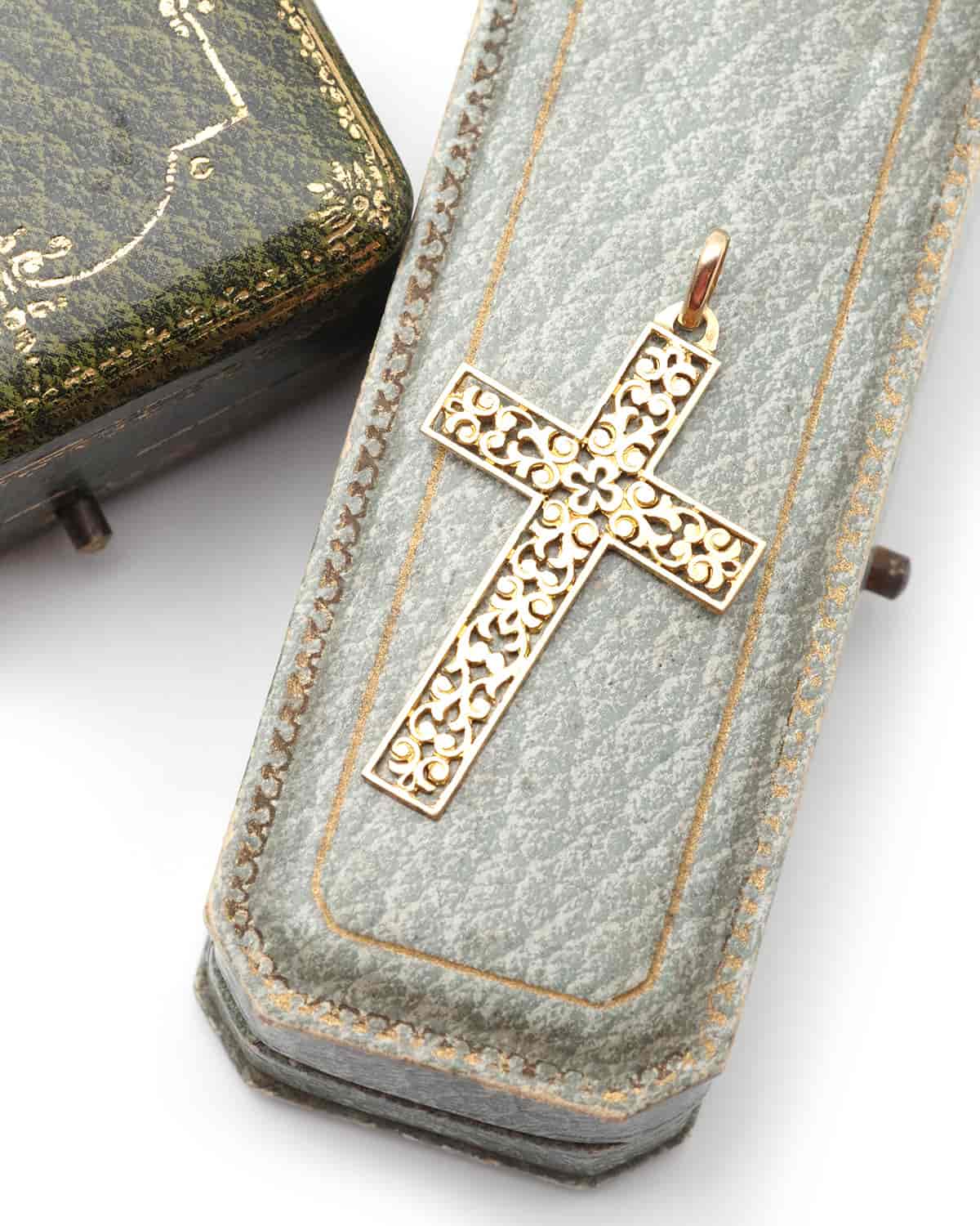 Gold cross pendant