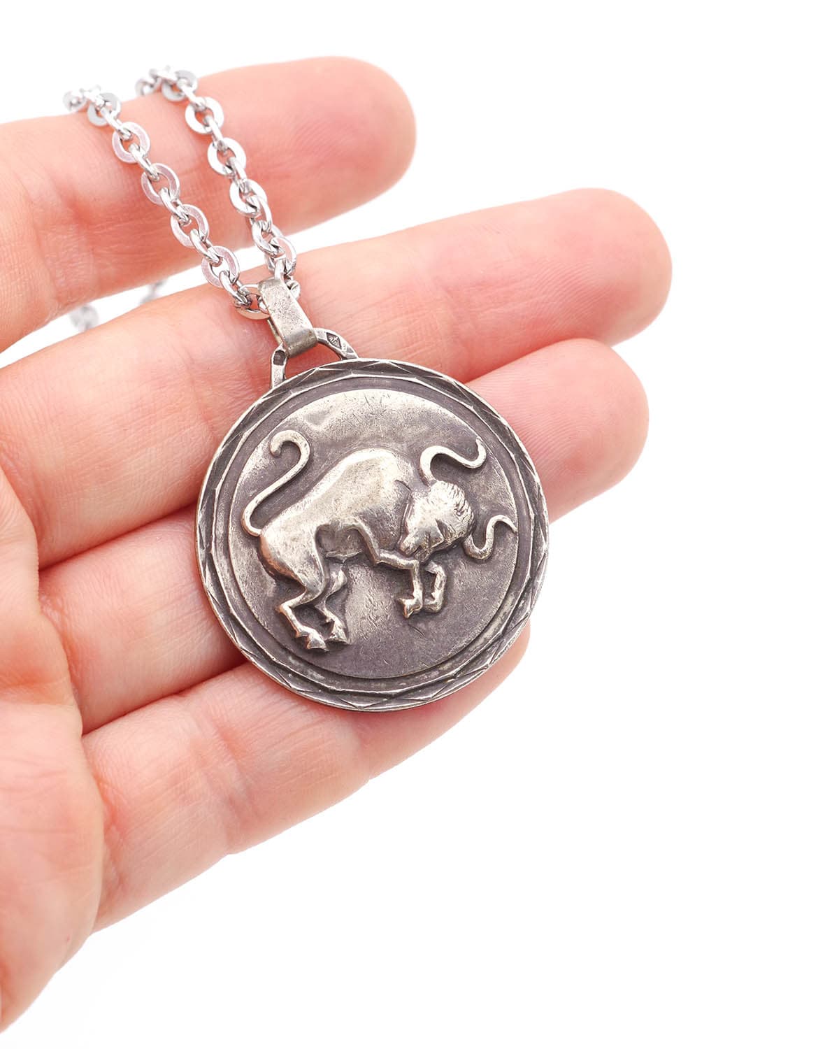 Silver taurus pendant necklace