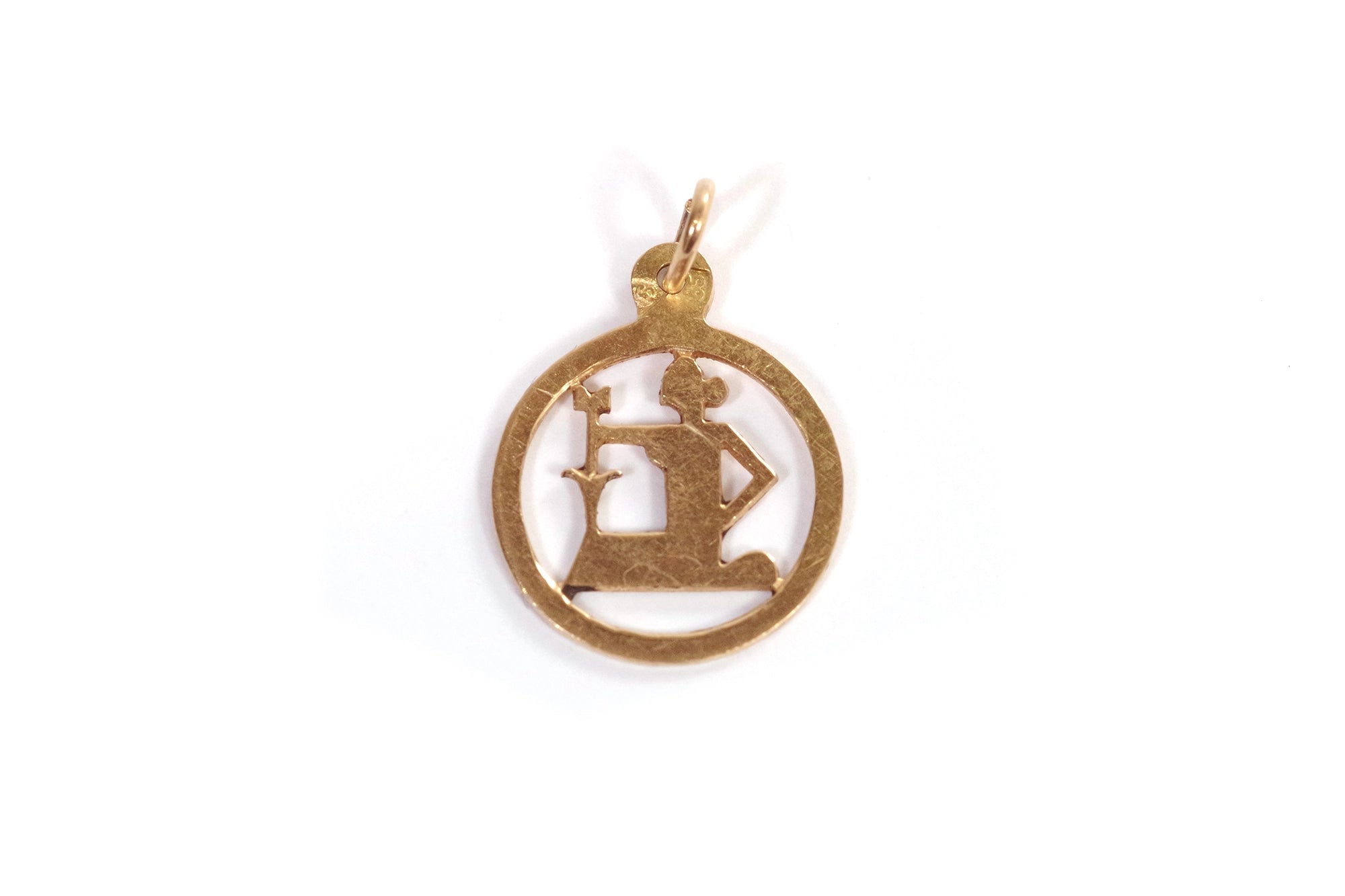woman gold pendant