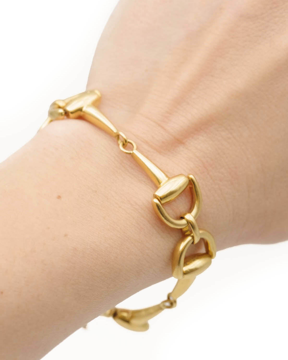 Hermès style hors bit bracelet in gold
