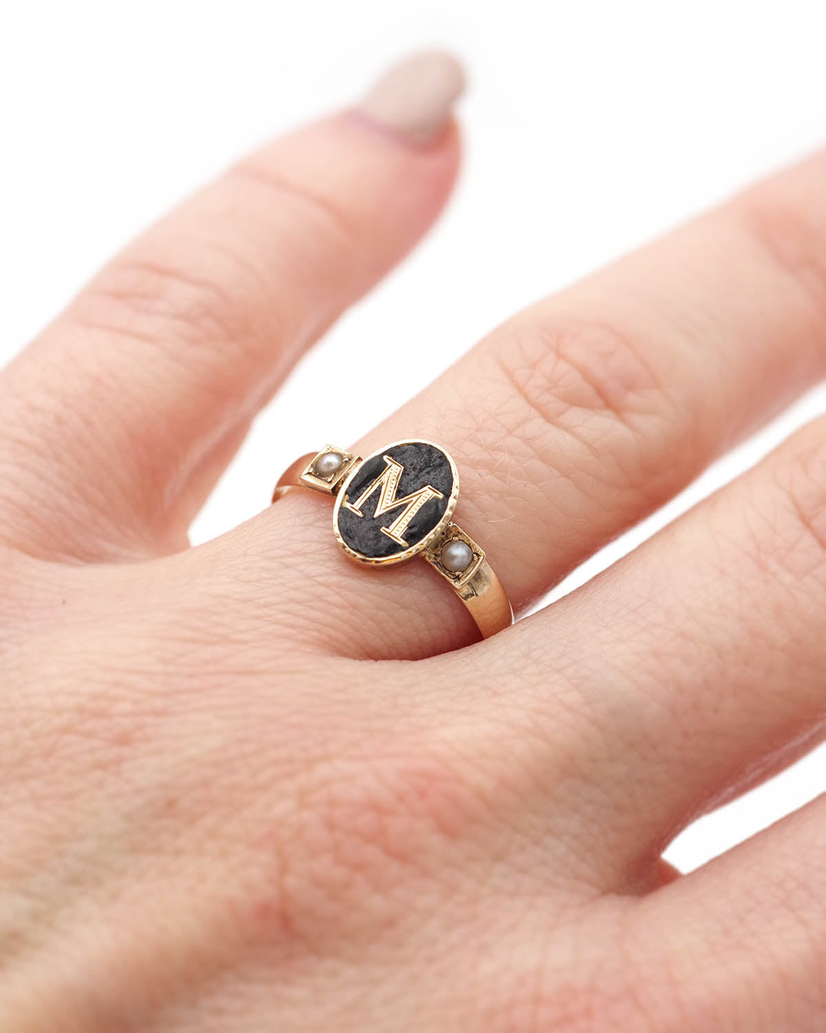 Black enamel M letter ring