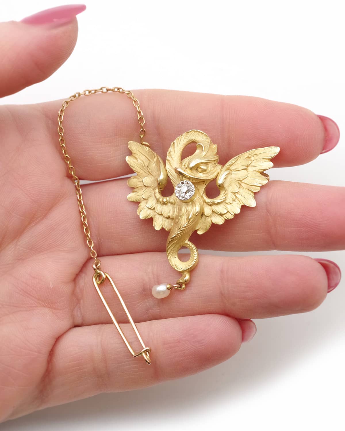 Diamond chimera brooch