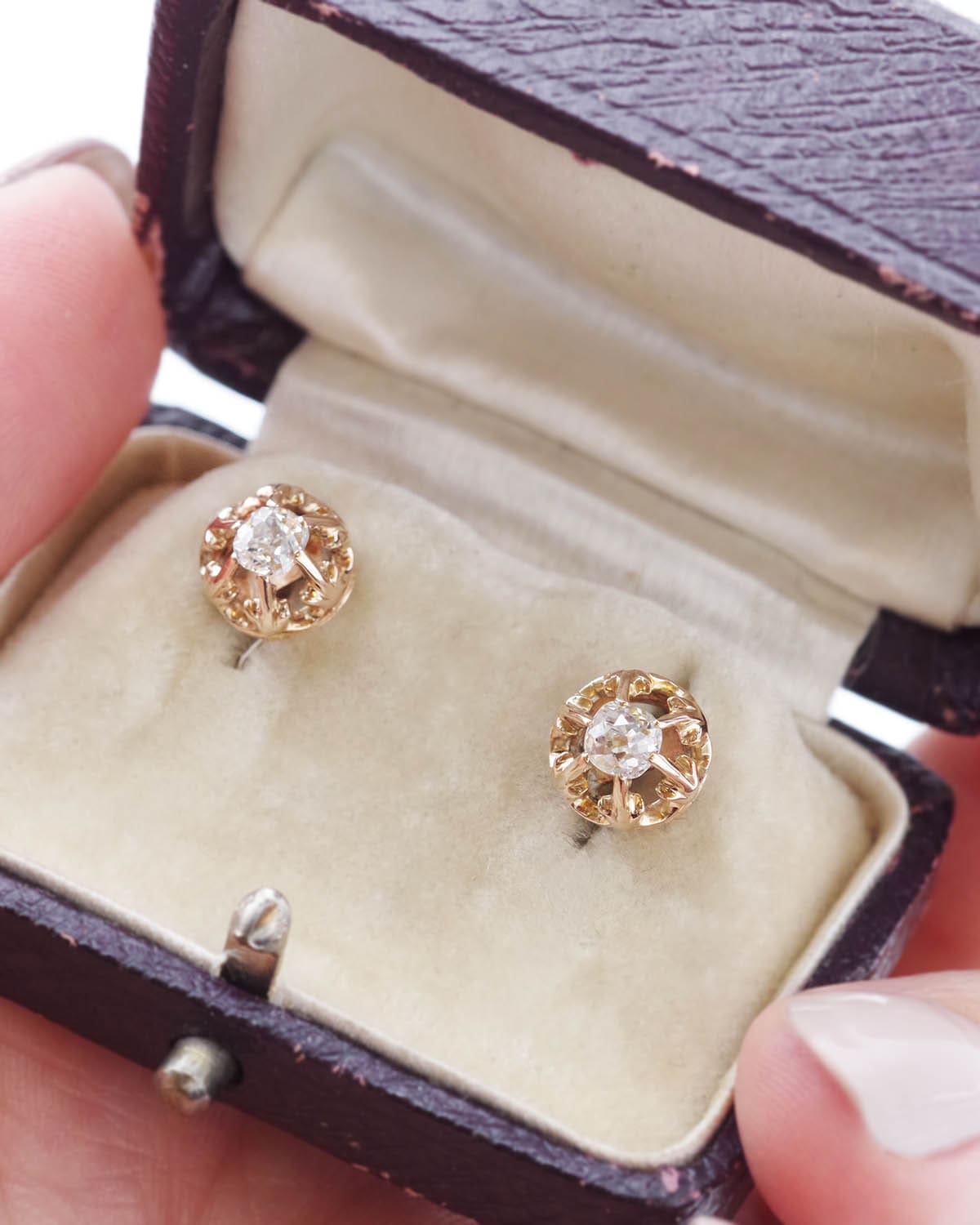 Diamond stud earrings in gold