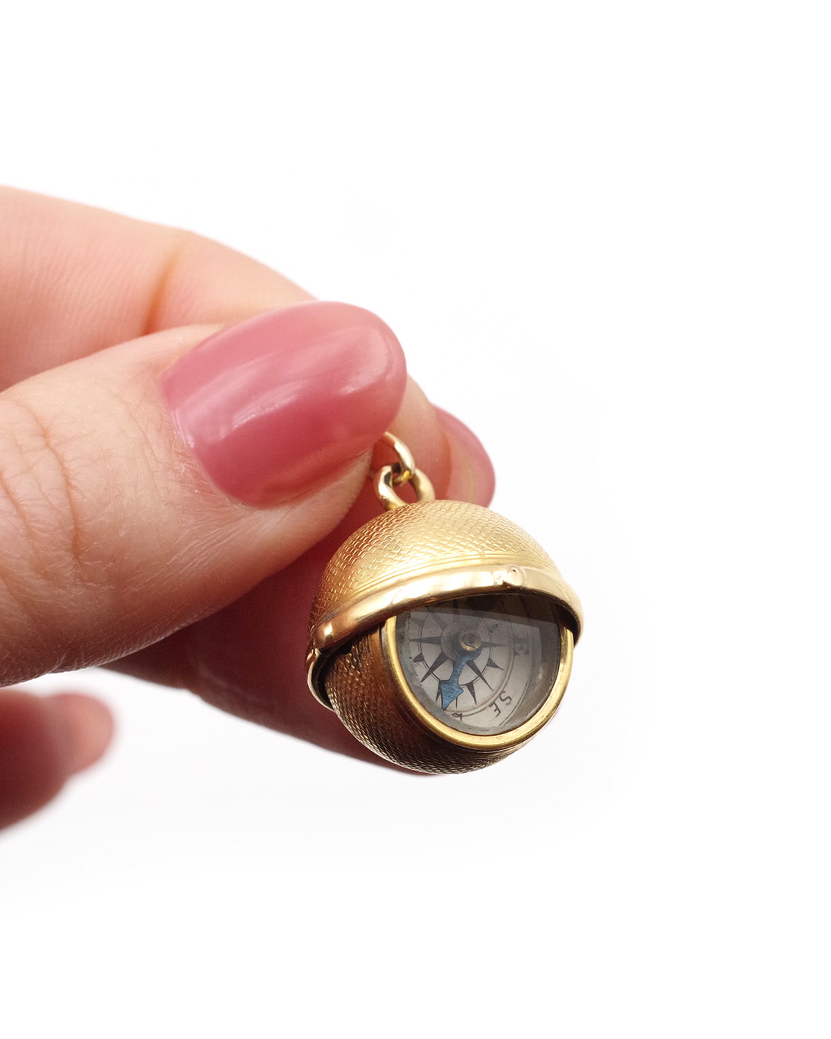Pendentif boussole pivotante en or