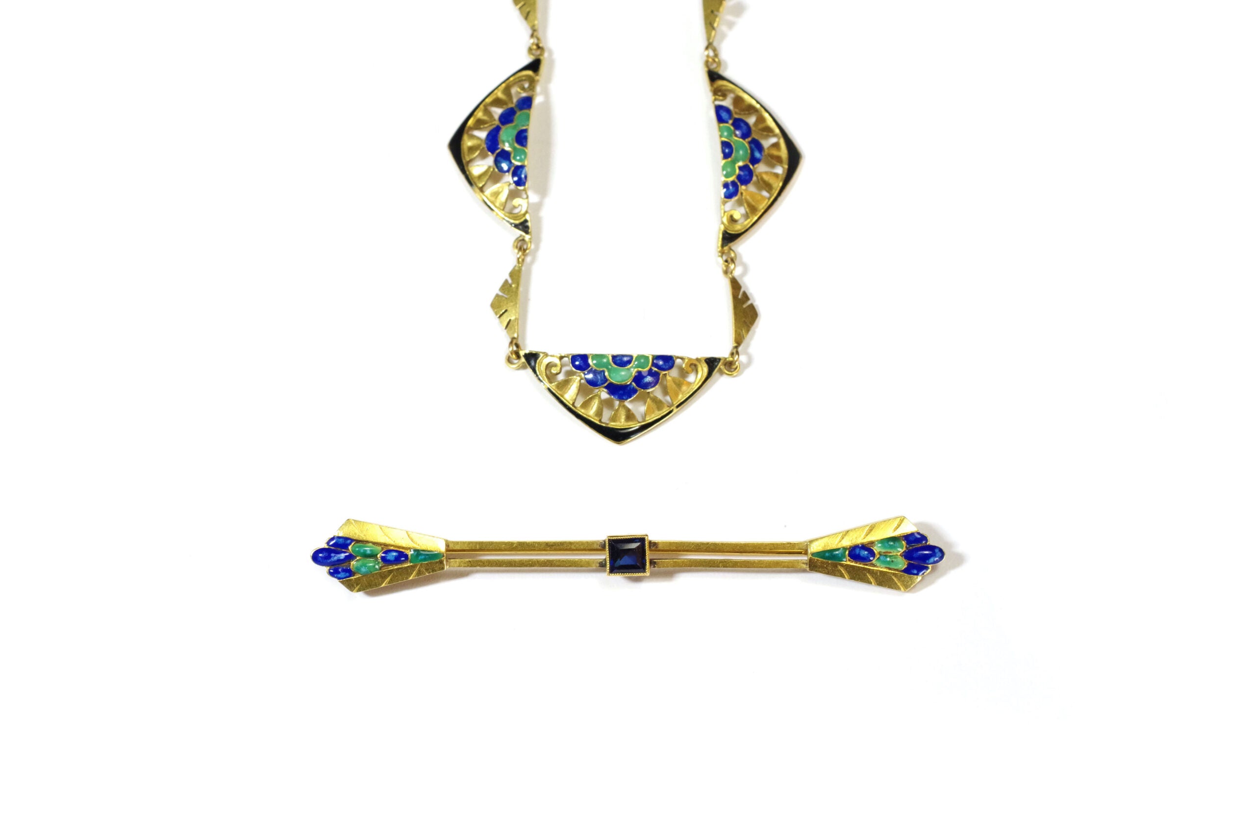 collier et broche plumes de paon