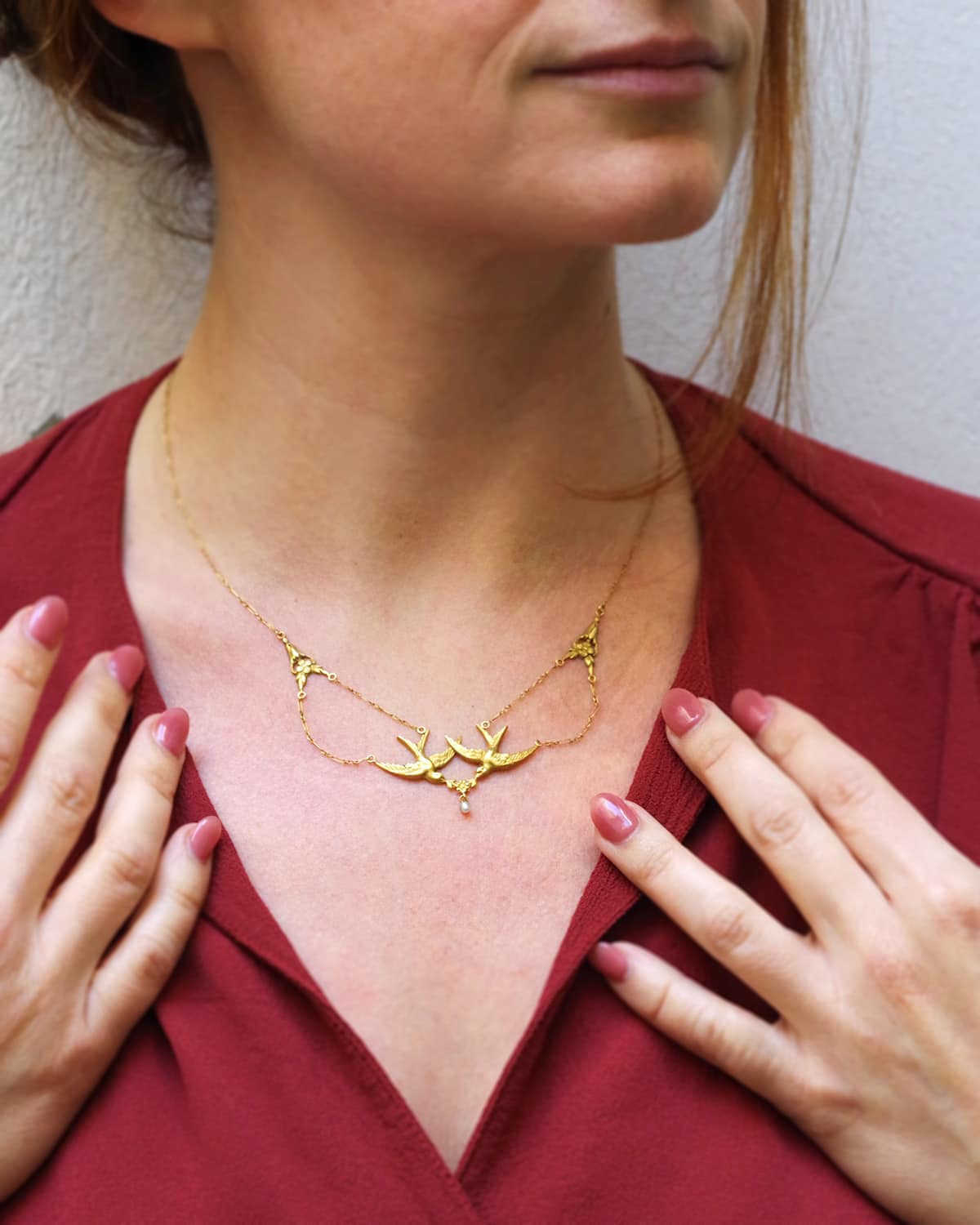 Art Nouveau swallow necklace in gold