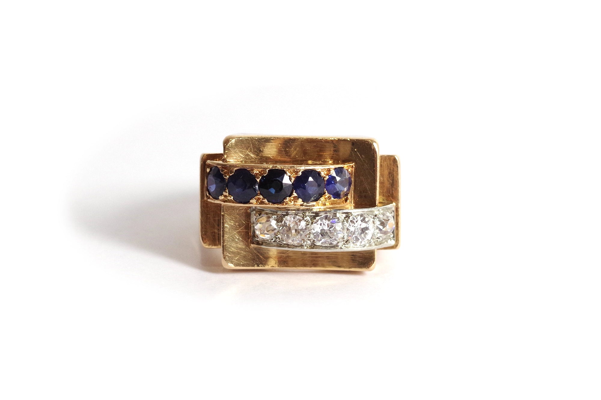 Tank ring set with diamonds and sapphire