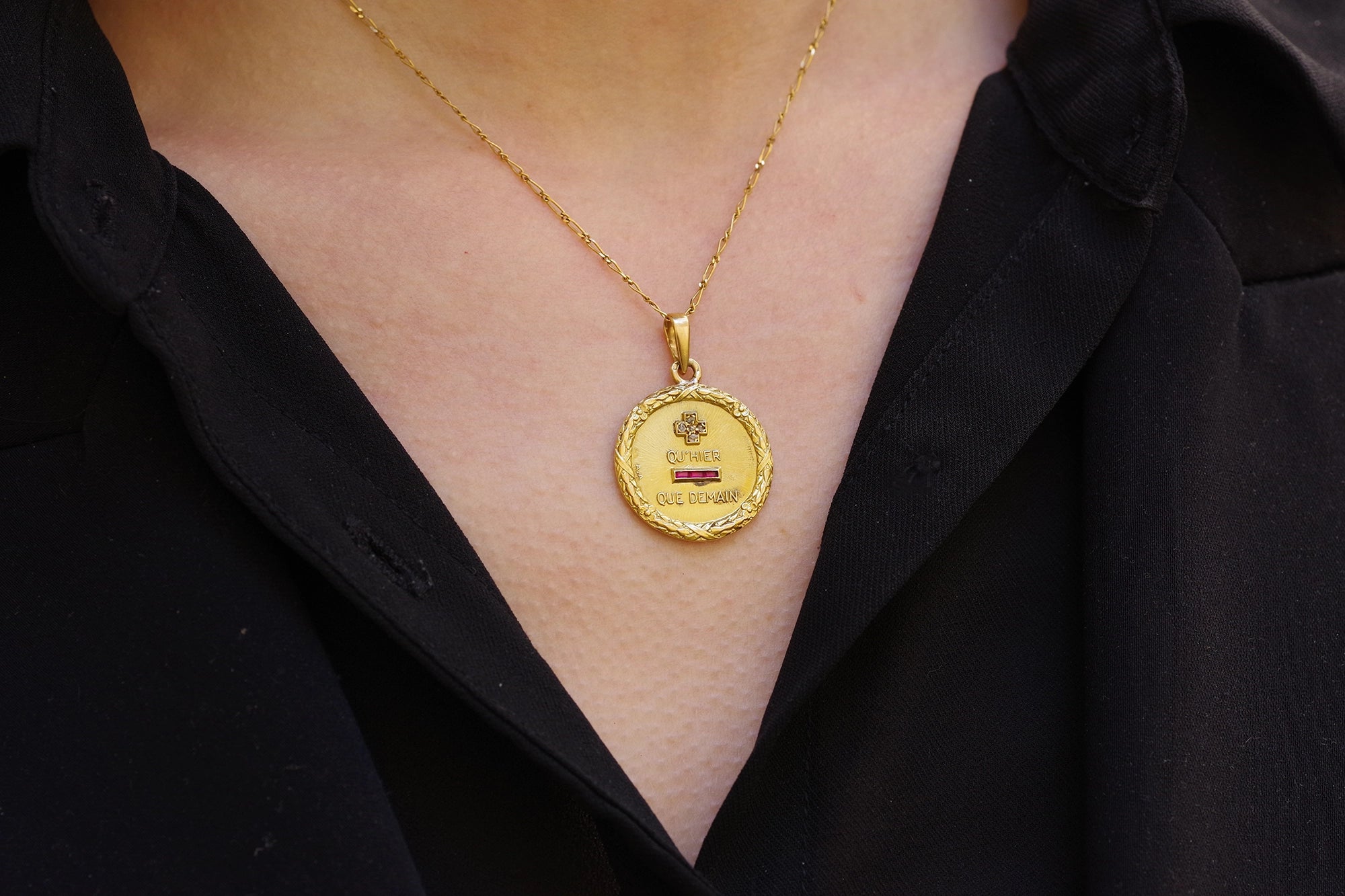 Gold love medal pendant