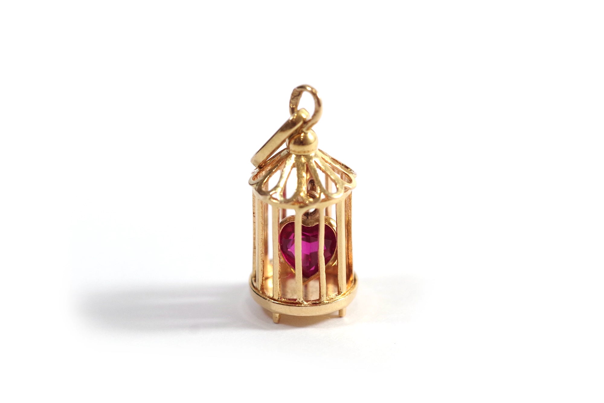 Pendentif en or et rubis amour en cage