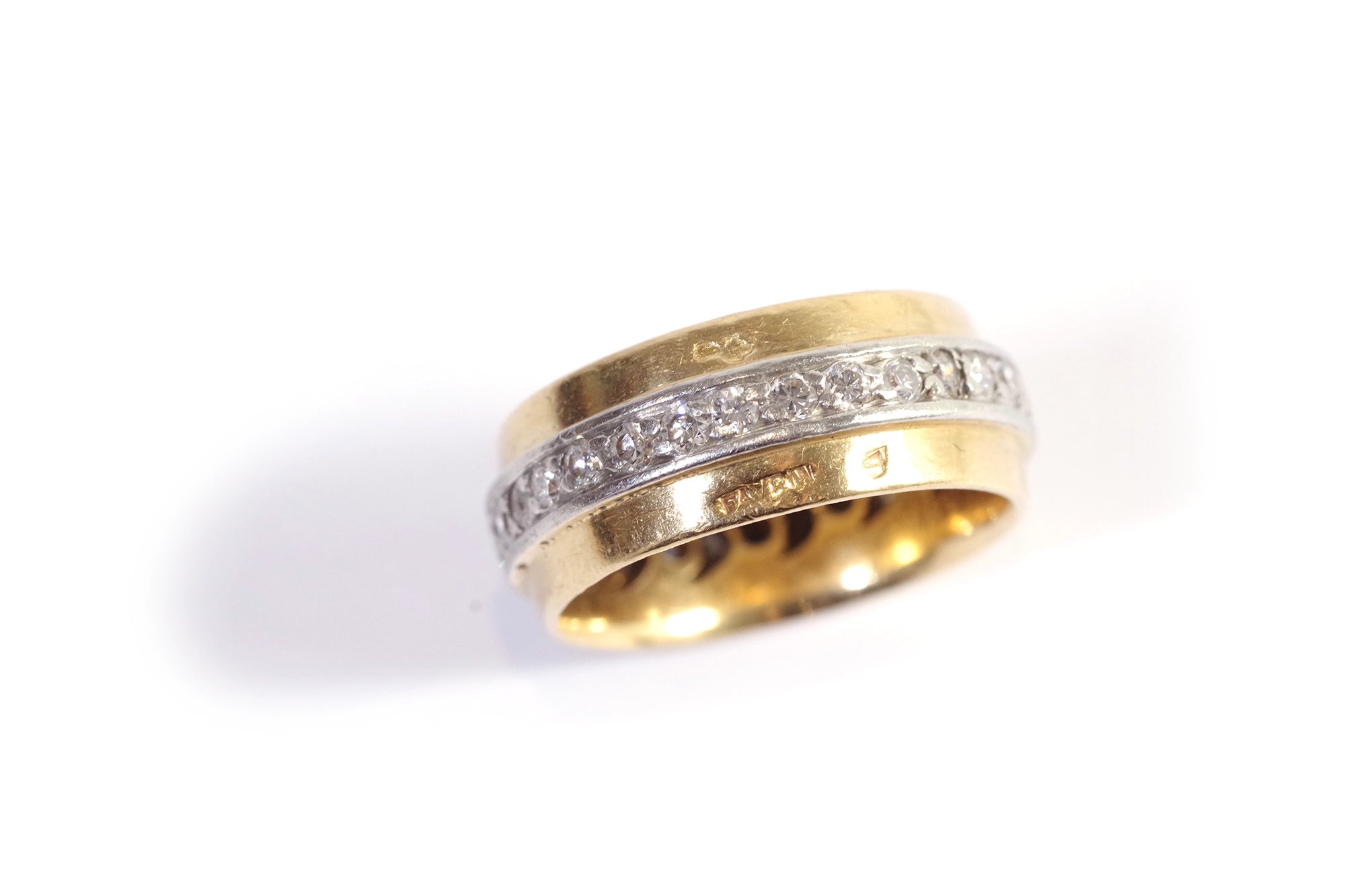 Gold and platinum diamond ring