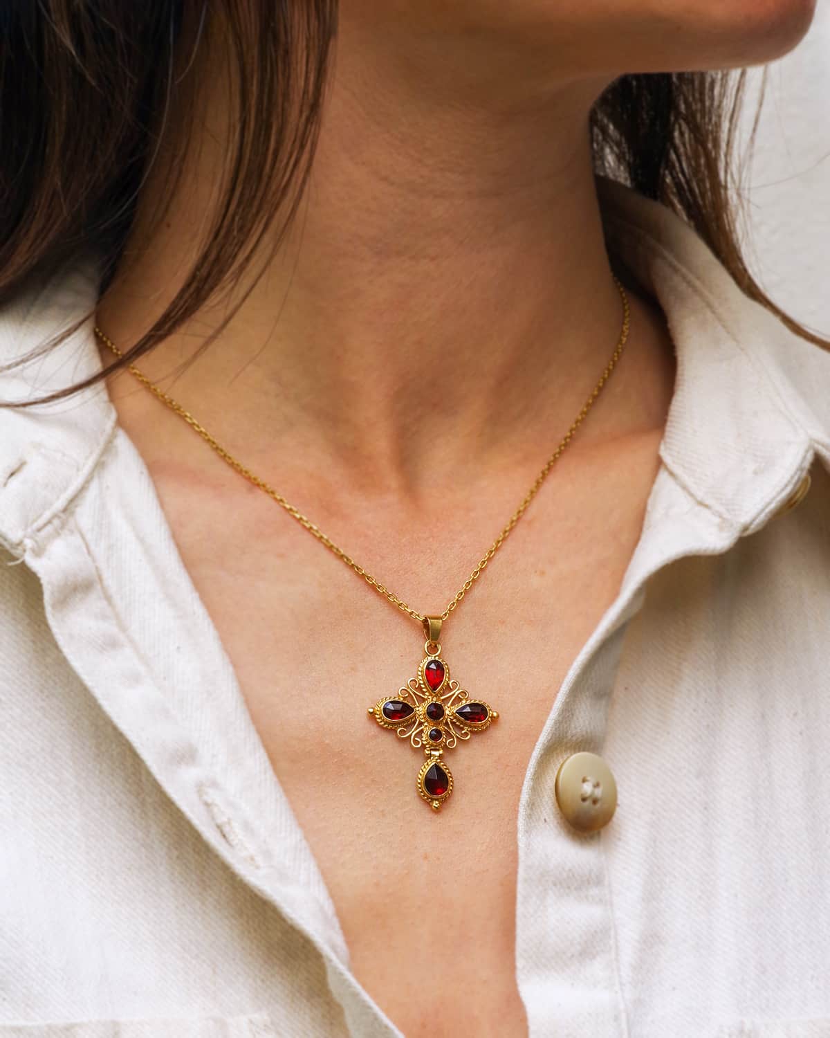 Gold badine perpignan garnet cross pendant