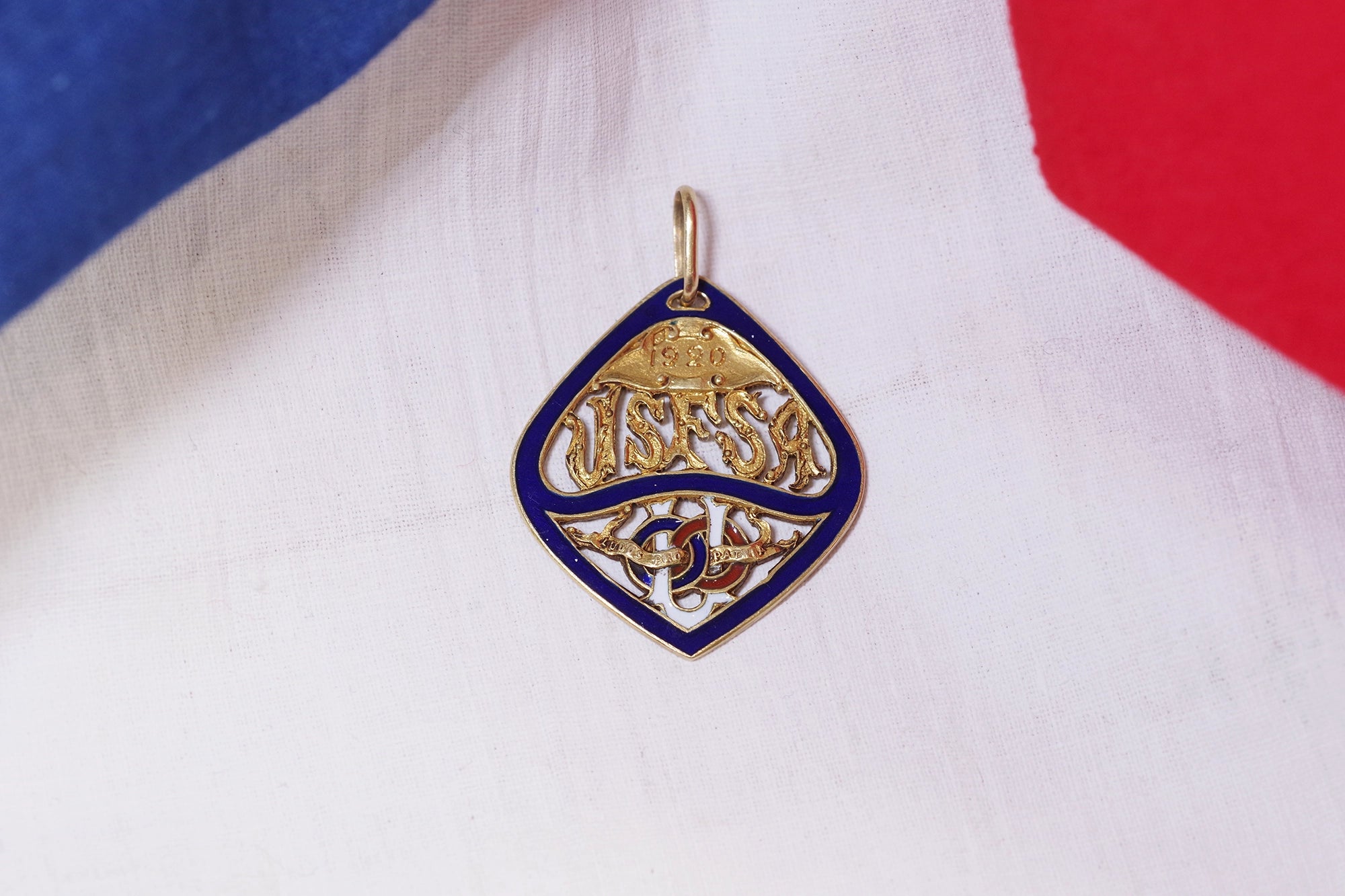 Pendentif athlétisme ancien en or