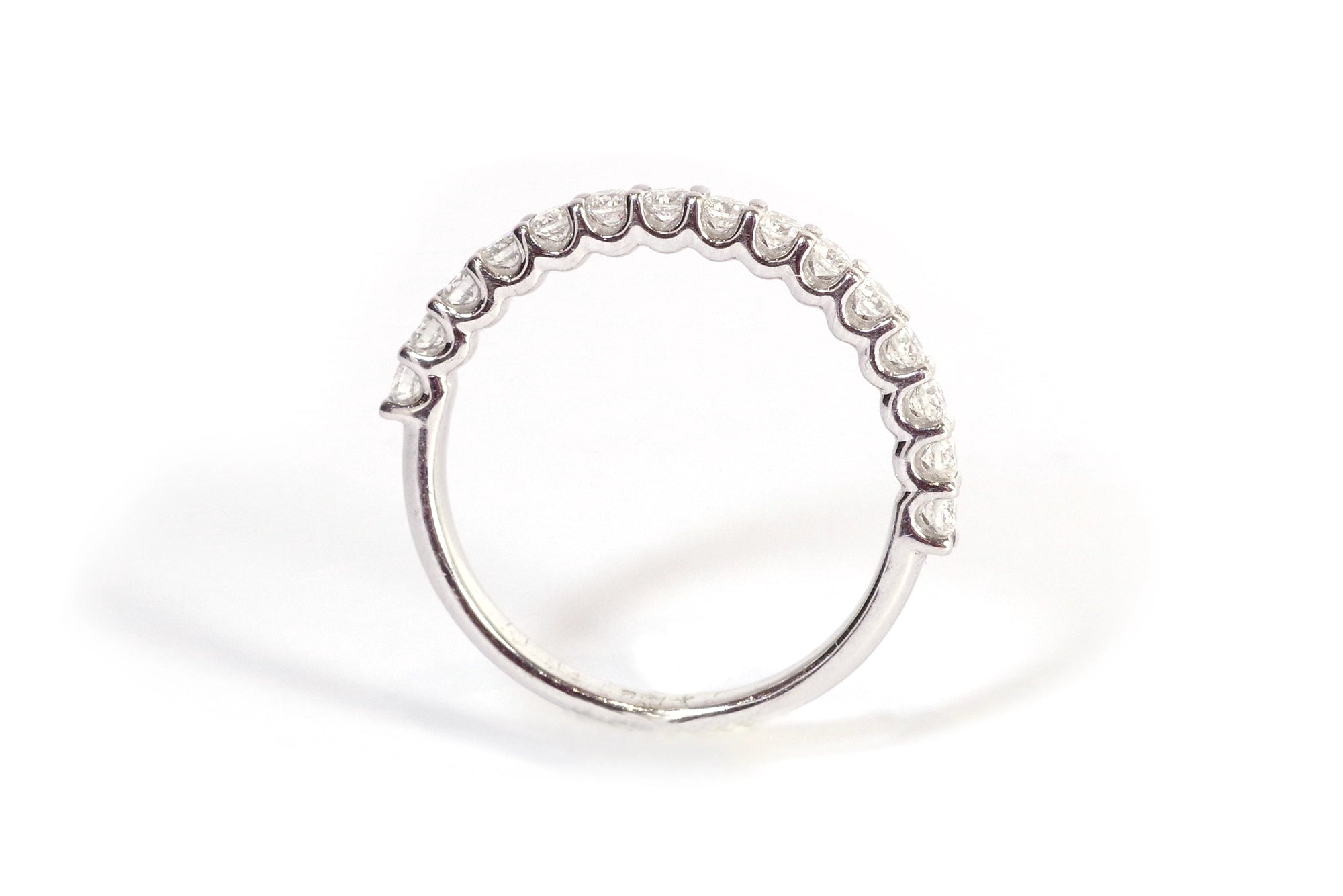 Half brilliant cut eternity ring