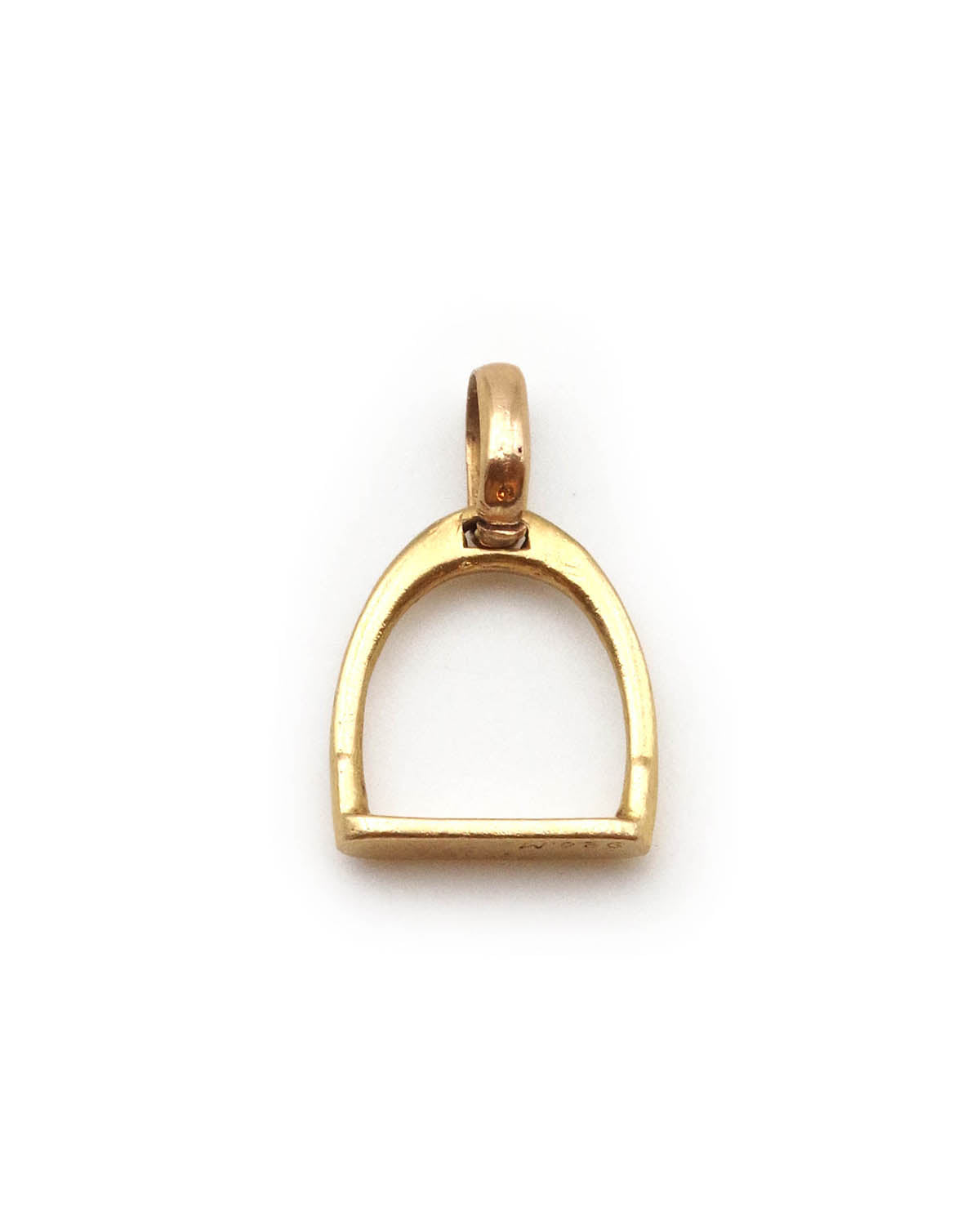 Stirrup gold pendant by Mellerio