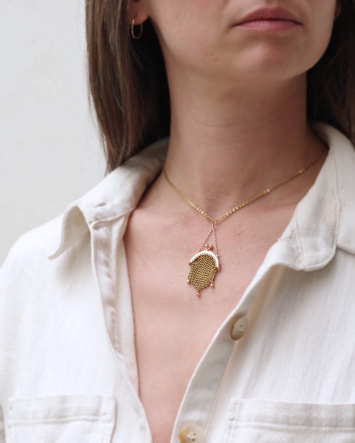 Pendentif bourse de poupée