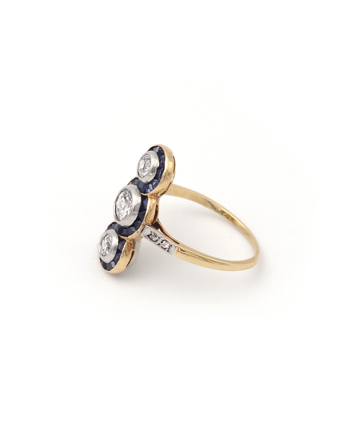 Three diamond sapphire ring in gold