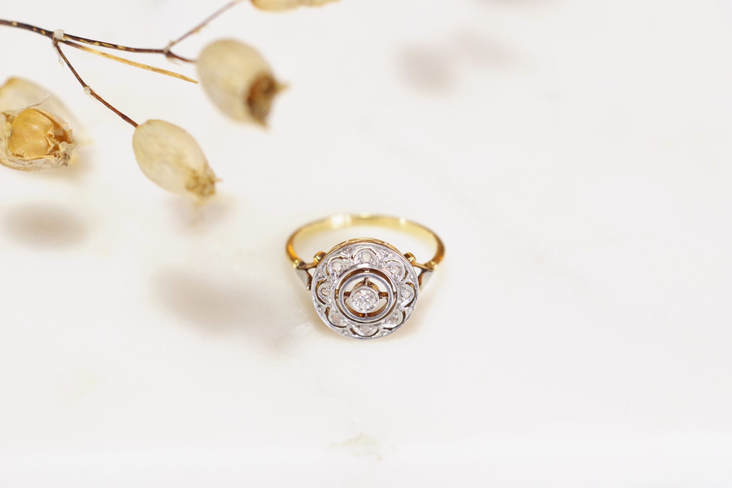 circular diamond Art Deco ring