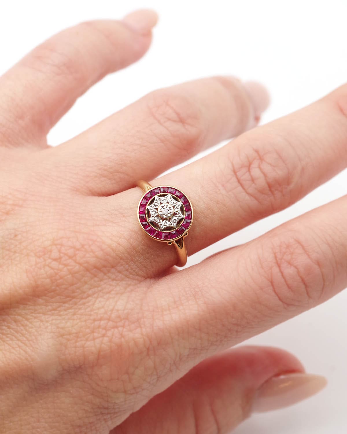 circular ruby ring in platinum and gold