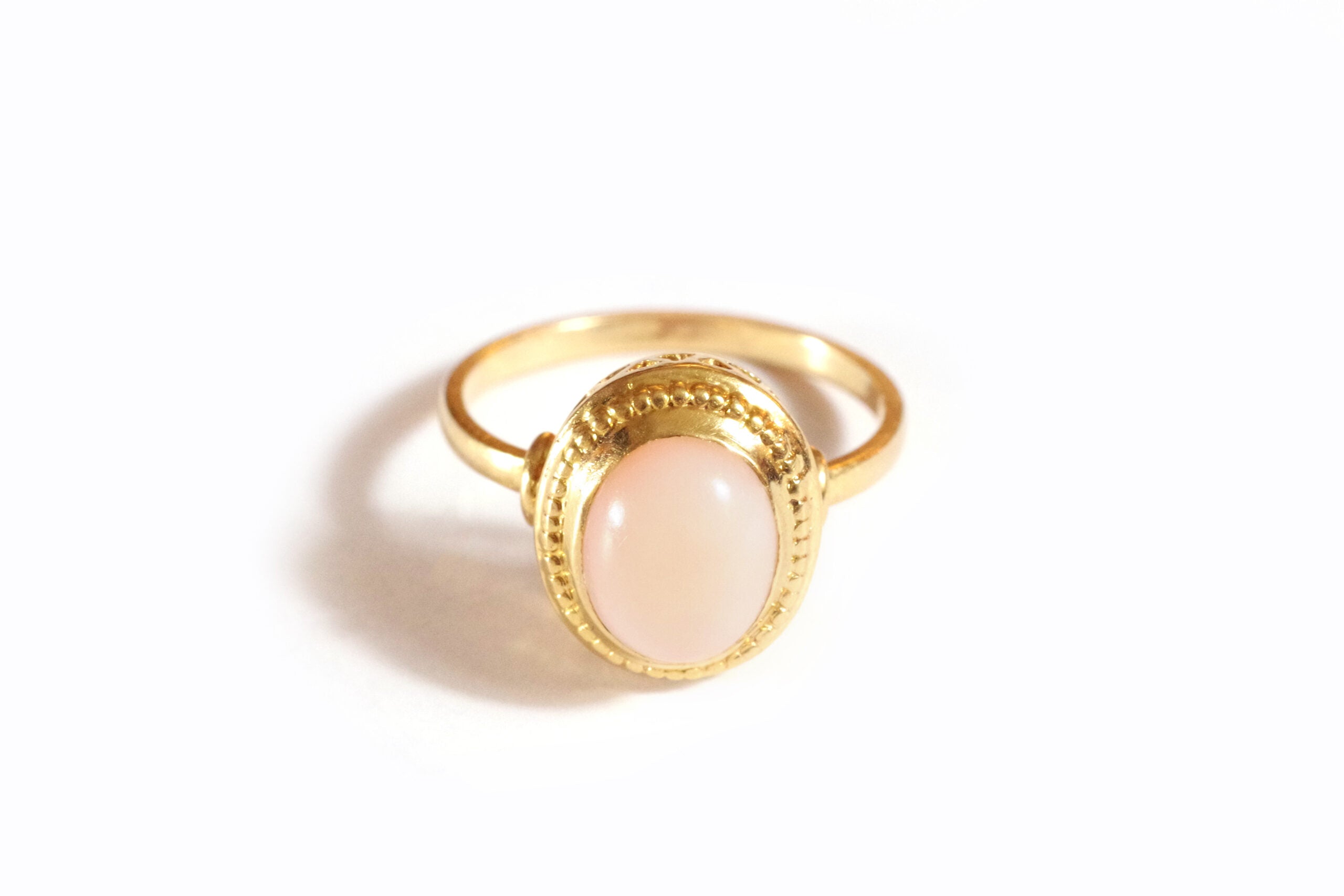 angel skin cabochon coral ring